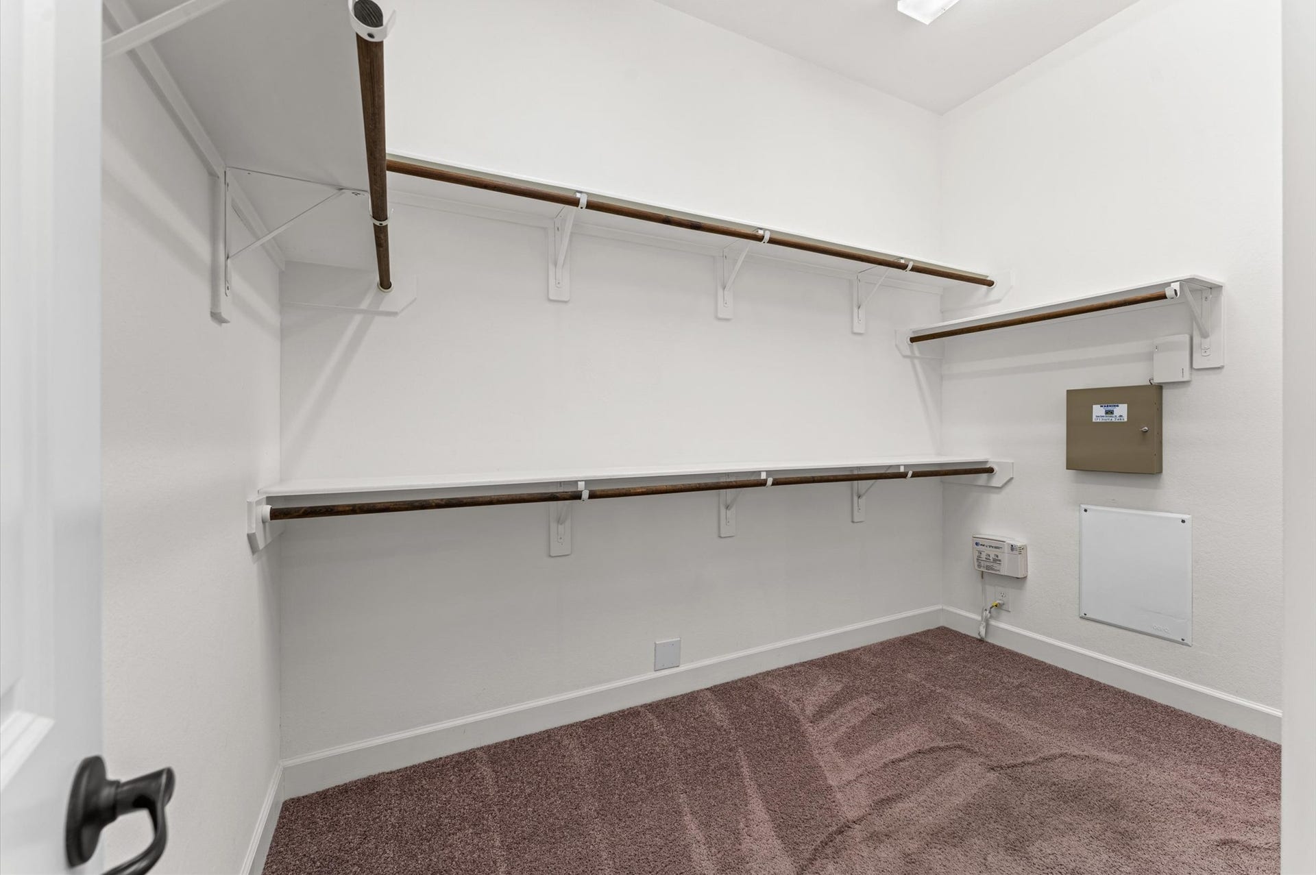 Conveniently located within the primary bathroom, the spacious walk-in closet offers easy access and everyday functionality