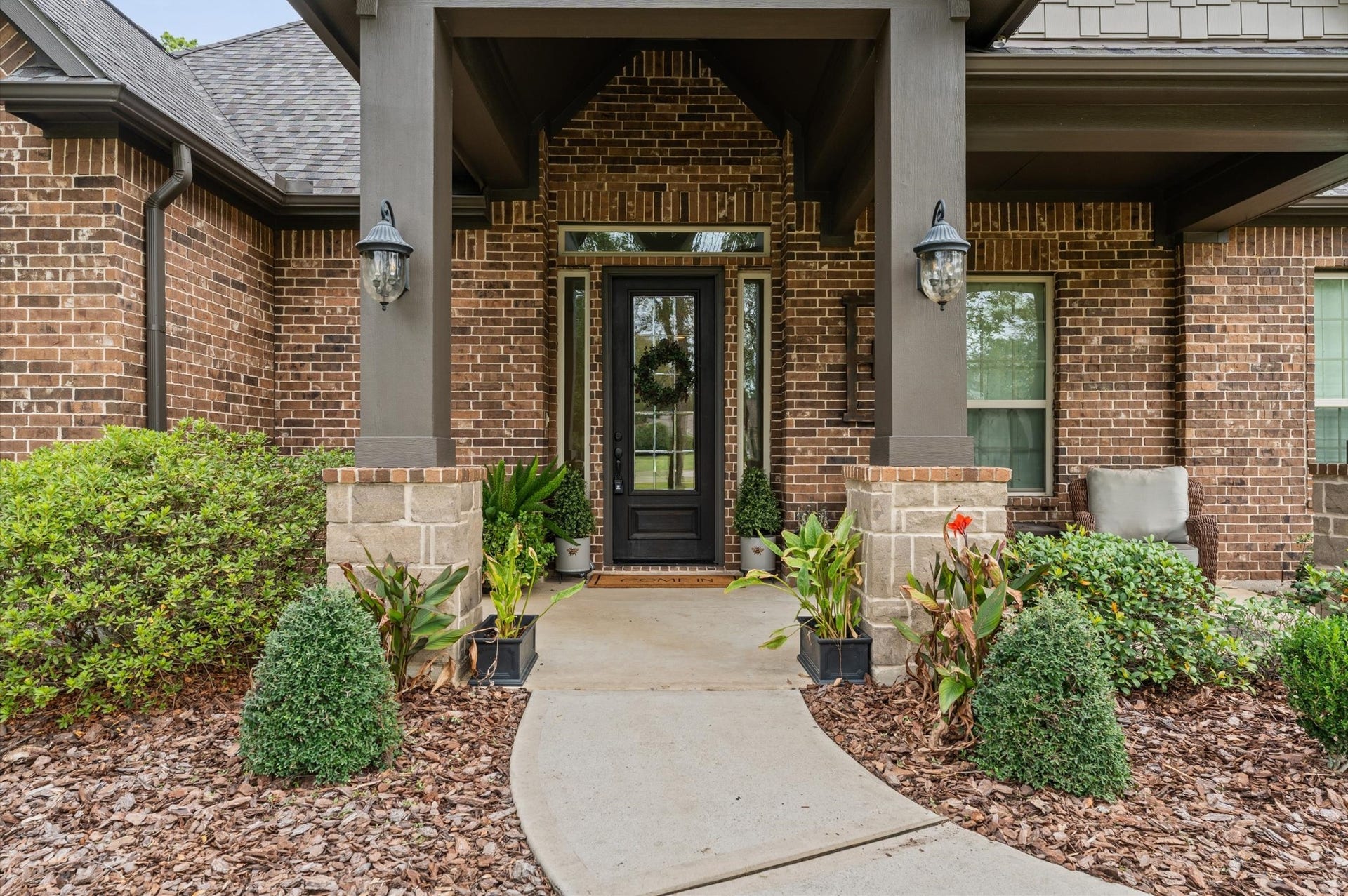 A welcoming front patio offers the perfect setting to start your morning