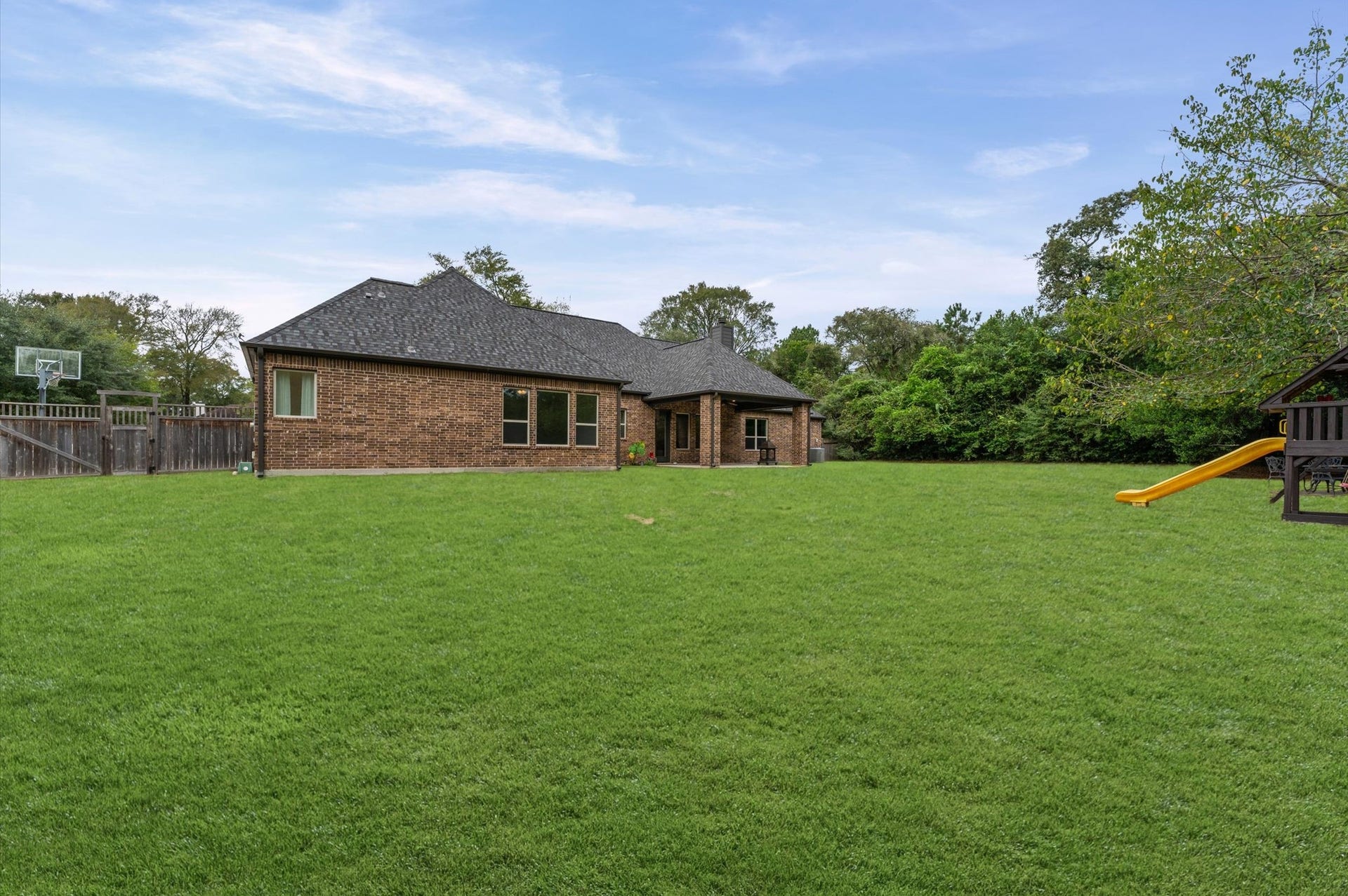 Your very own private one-acre retreat! Enjoy the perfect blend of space, privacy, and tranquility, surrounded by mature trees and natural beauty