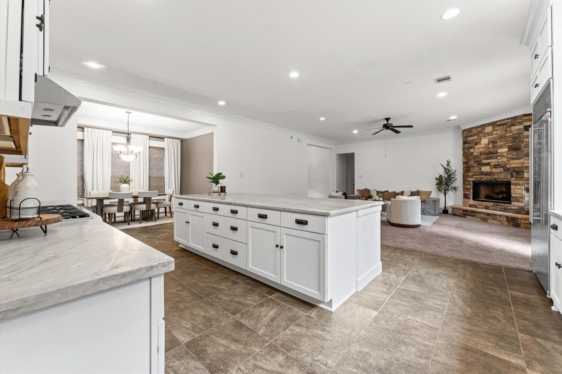This thoughtfully designed layout highlights the functionality of distinct spaces, each offering its own purpose and privacy while seamlessly blending together to create a cohesive, elegant, and inviting atmosphere!