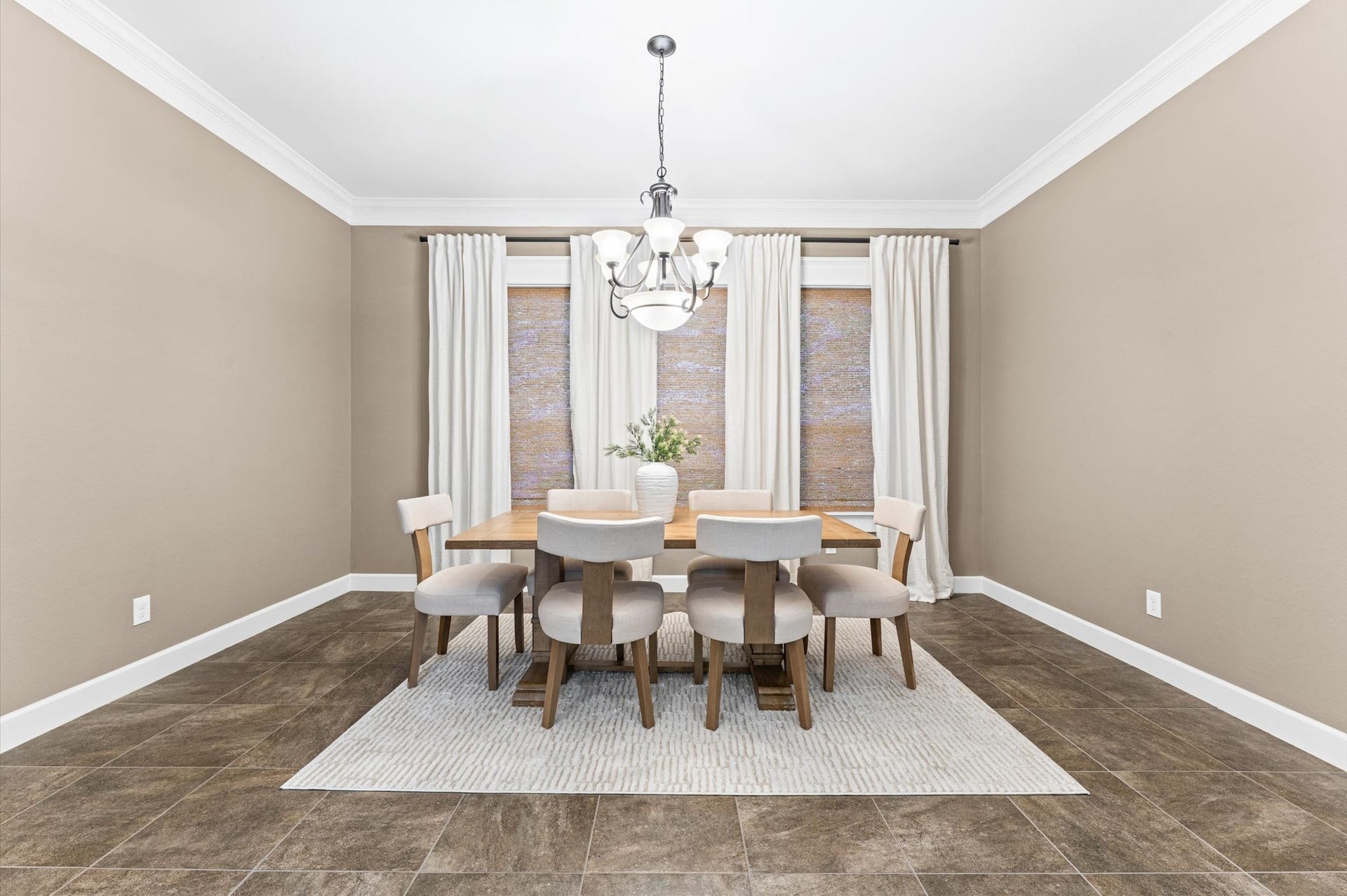 An expansive formal dining room exuding timeless elegance.