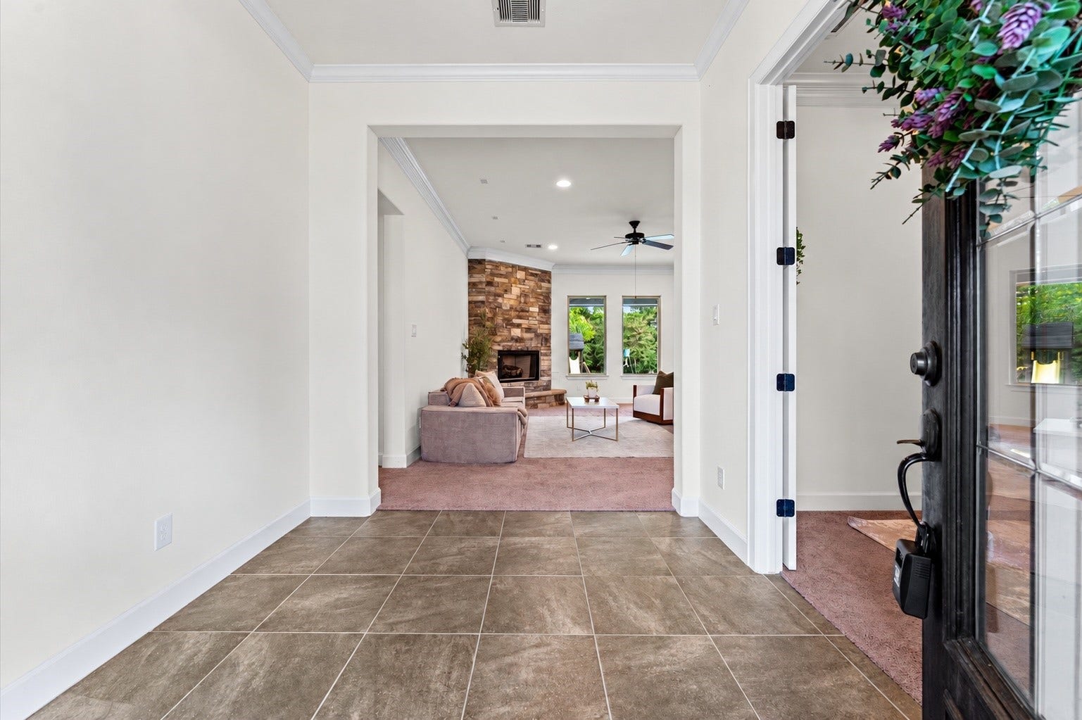 Step inside your new home and be welcomed by an abundance of natural light, a stunning stone fireplace anchoring the formal living room, and a versatile study/office conveniently located near the entrance.