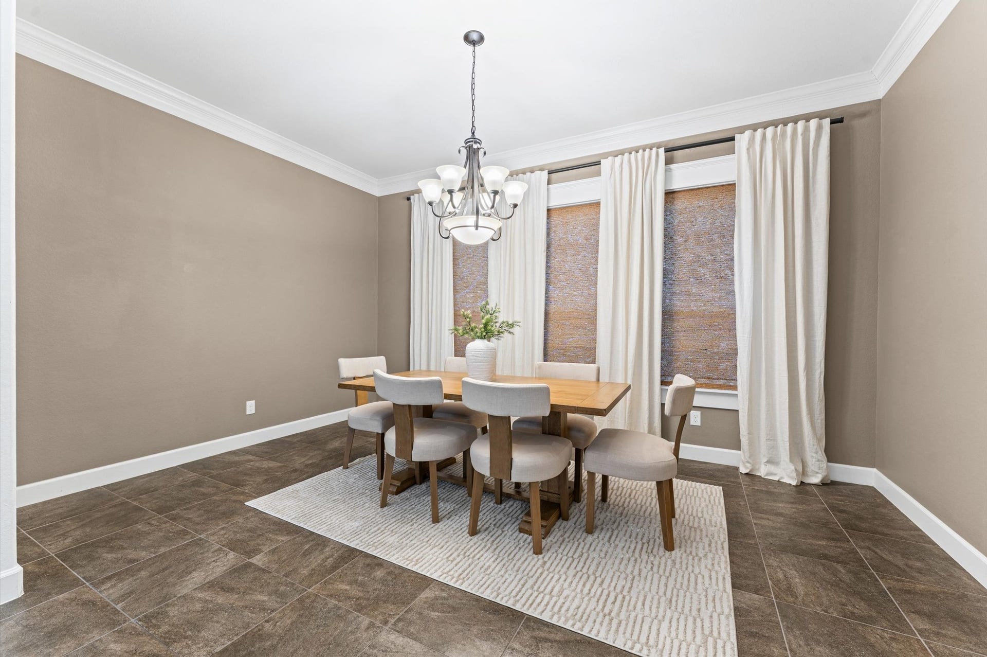 The oversized formal dining room offers timeless elegance and ample space