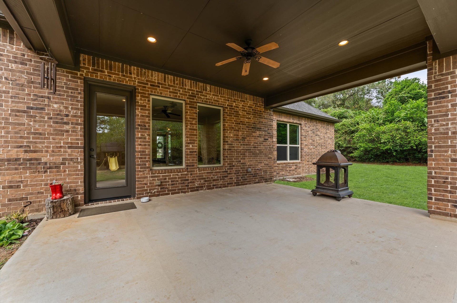 Step outside to your inviting covered back patio, the perfect place to start your morning with a cup of coffee while enjoying the peaceful surroundings, beautiful backyard views, and added privacy of no rear neighbors