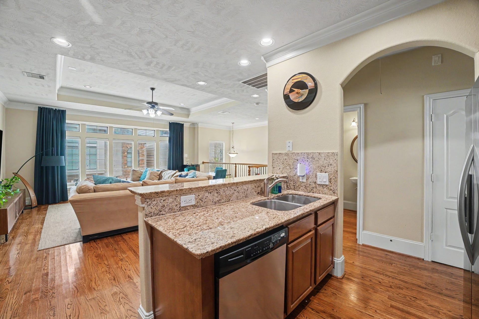 View from litchenn to living. Powder room and pantry on your right