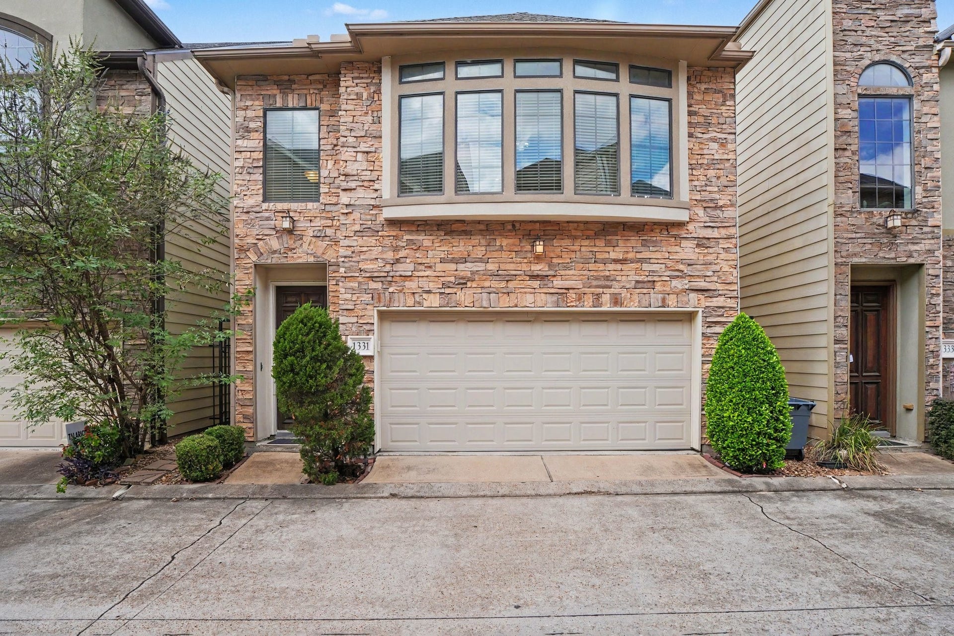 A great place to call home with a 2 car garage and visitor parking spots just across the way.