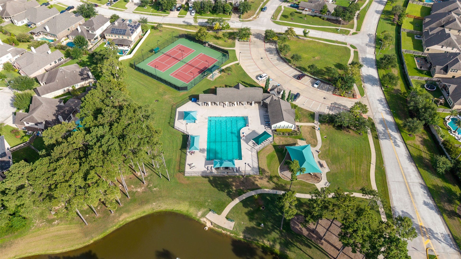 13411 Alpine Mountain Lane, Tomball, TX 77377 Neighborhood pool, covered playground and tennis courts just minutes from home.