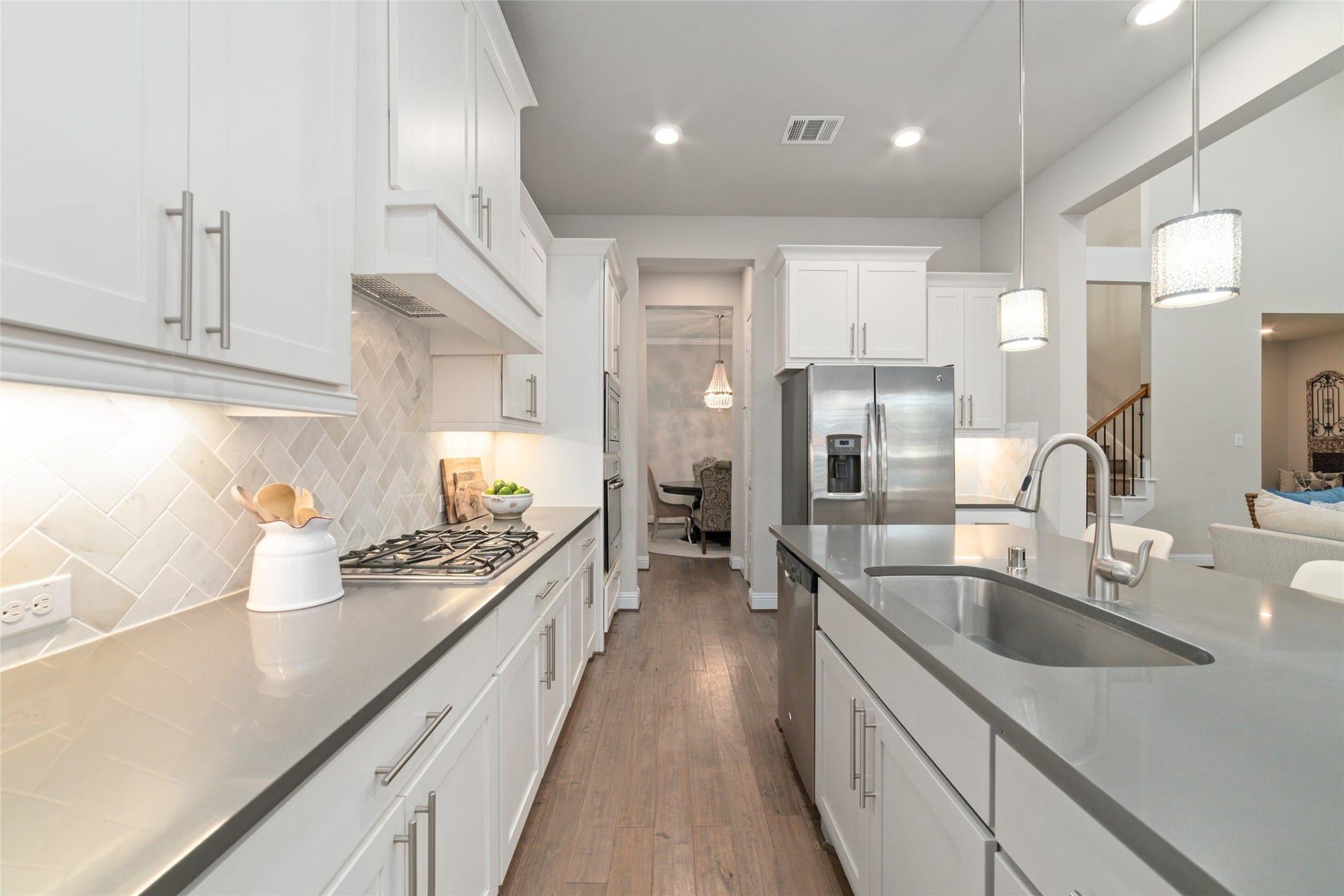 13411 Alpine Mountain Lane, Tomball, TX 77377 Plenty of countertop workspace, storage and an open layout any home chef will appreciate.