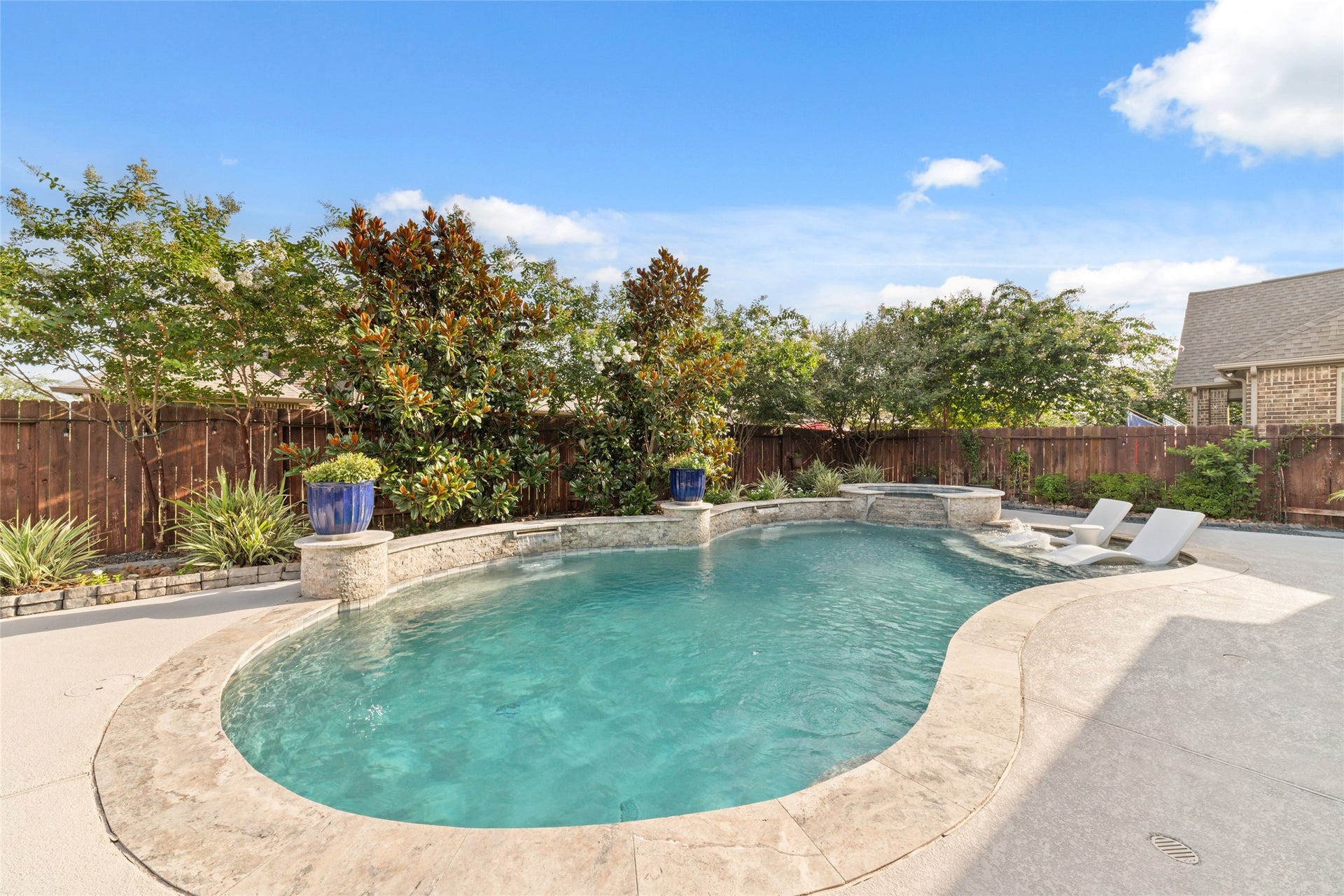 13411 Alpine Mountain Lane, Tomball, TX 77377 Enjoy your own backyard oasis with sparkling pool and relaxing spa.