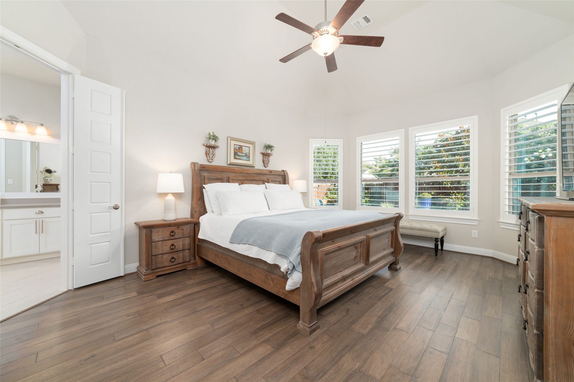 13411 Alpine Mountain Lane, Tomball, TX 77377 Generously sized primary suite with room for a sitting area overlooking the gorgeous backyard and pool.