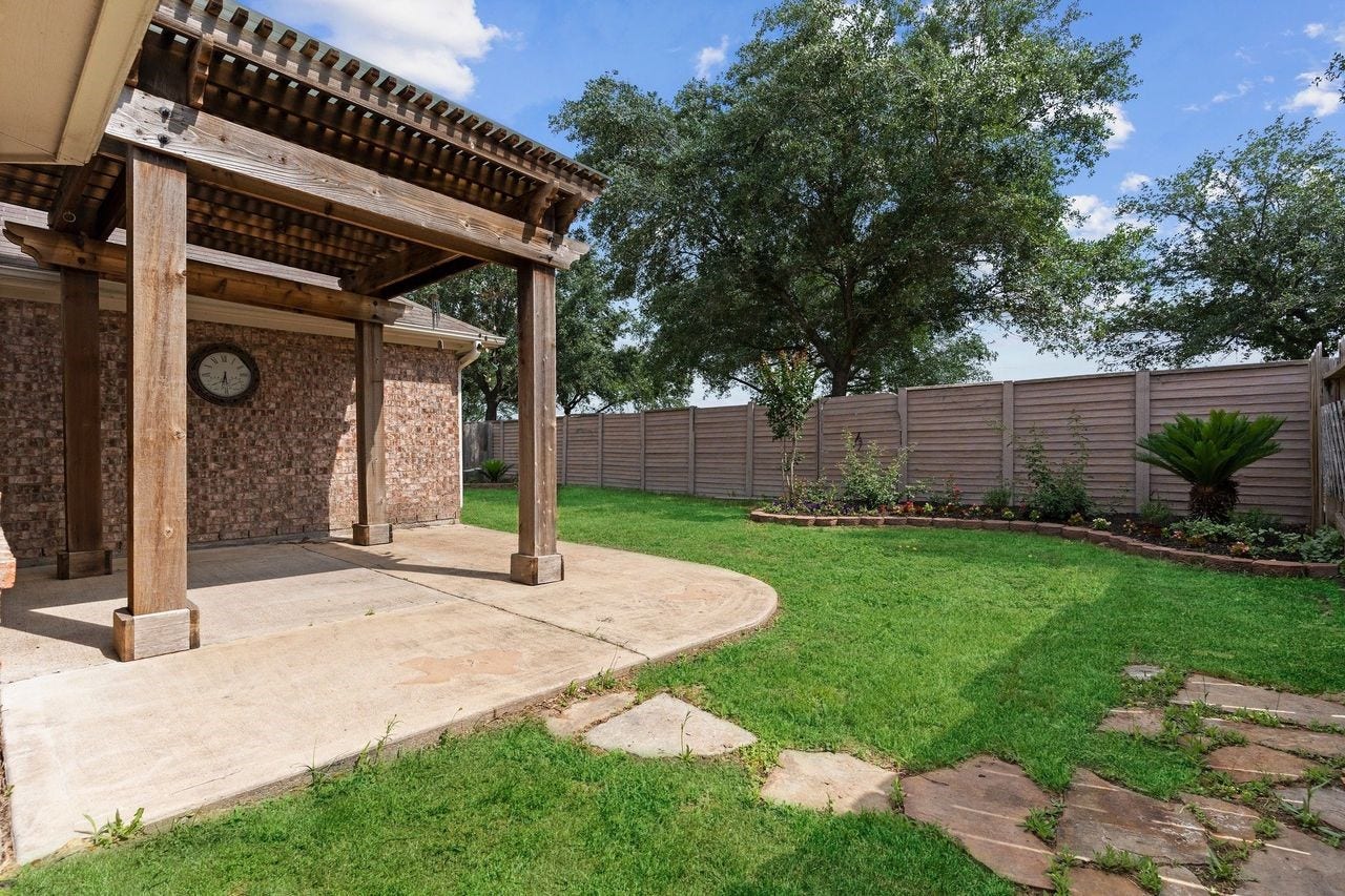7207 Palmito Ranch Drive, Richmond, TX 77406 Enjoy your private backyard oasis featuring a wonderful, covered patiothe perfect place to relax, unwind, or entertain family and friends while taking in the peaceful surroundings.