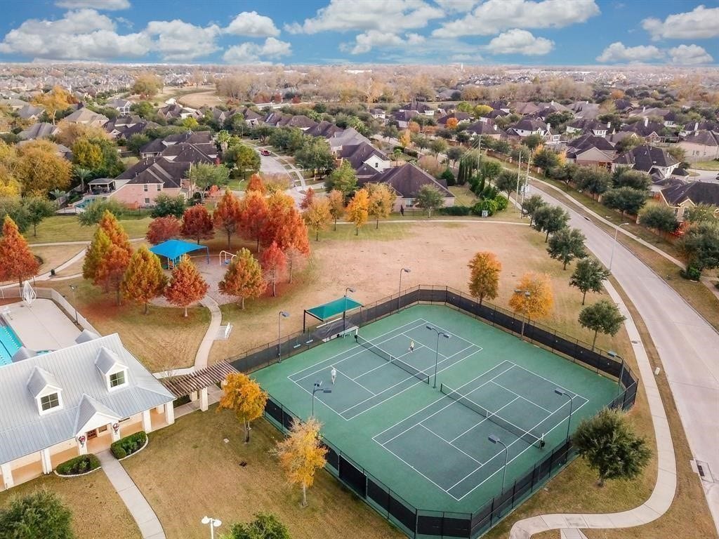7207 Palmito Ranch Drive, Richmond, TX 77406 Lakes to fish on, playgrounds, biking paths, splash pad, picturesque lakes with waterfalls, Majestic live oak and pecan trails, lighted tennis courts, Pools, Clubhouses, and Outstanding School for all Ages!