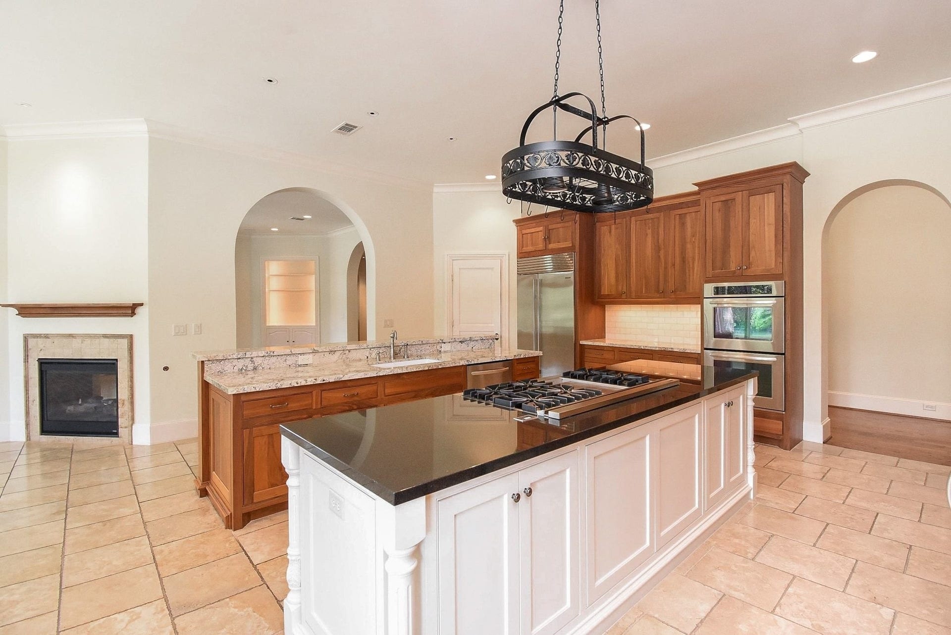 Chef's delight gas cooktop, pot rack, pots and pans drawers just to name a few of the custom touches