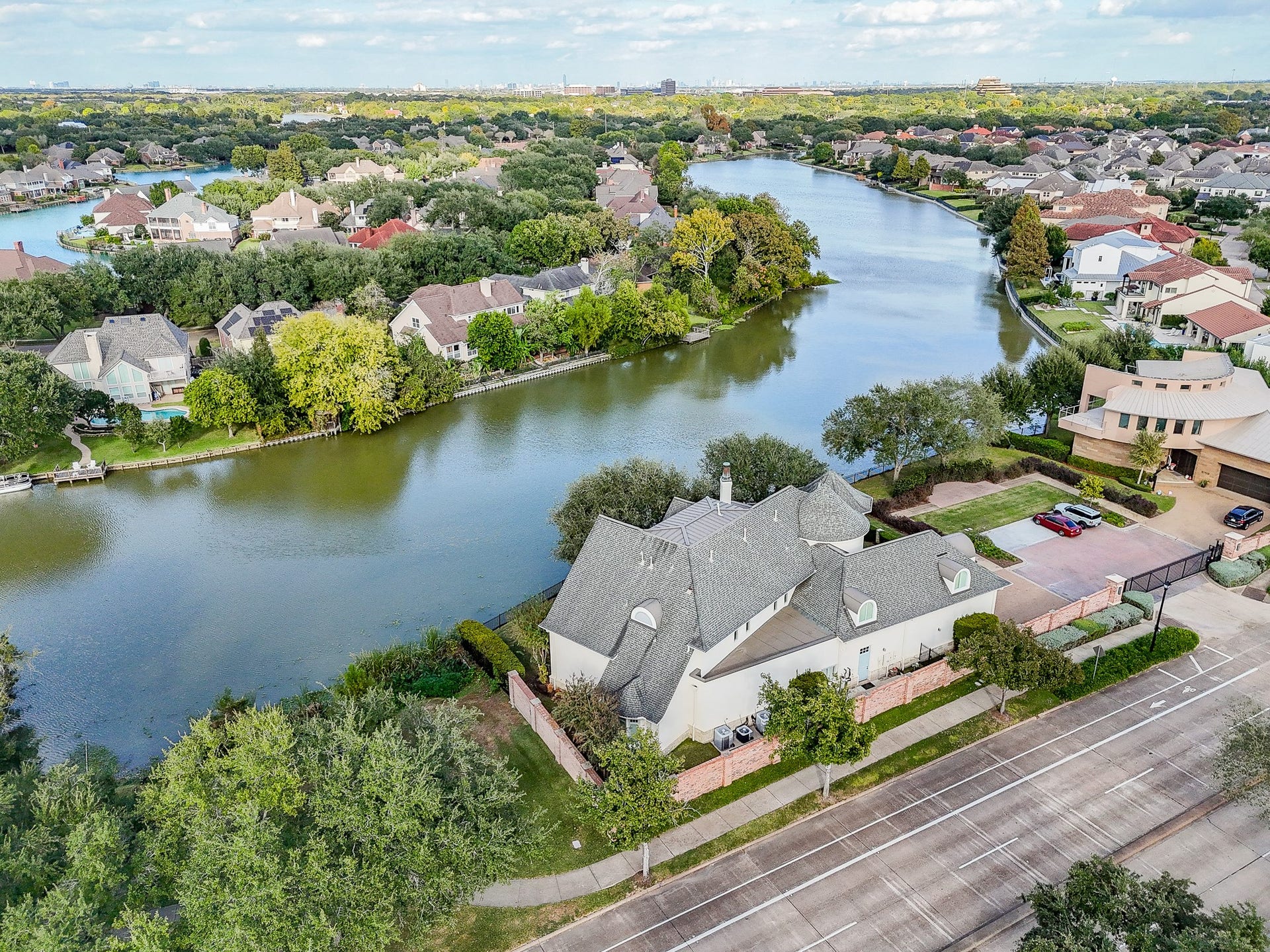 See the gate with only 2 homes able to access the additional parking for privacy galore.
HOA takes care of the gate, center area grass, trees, flowers