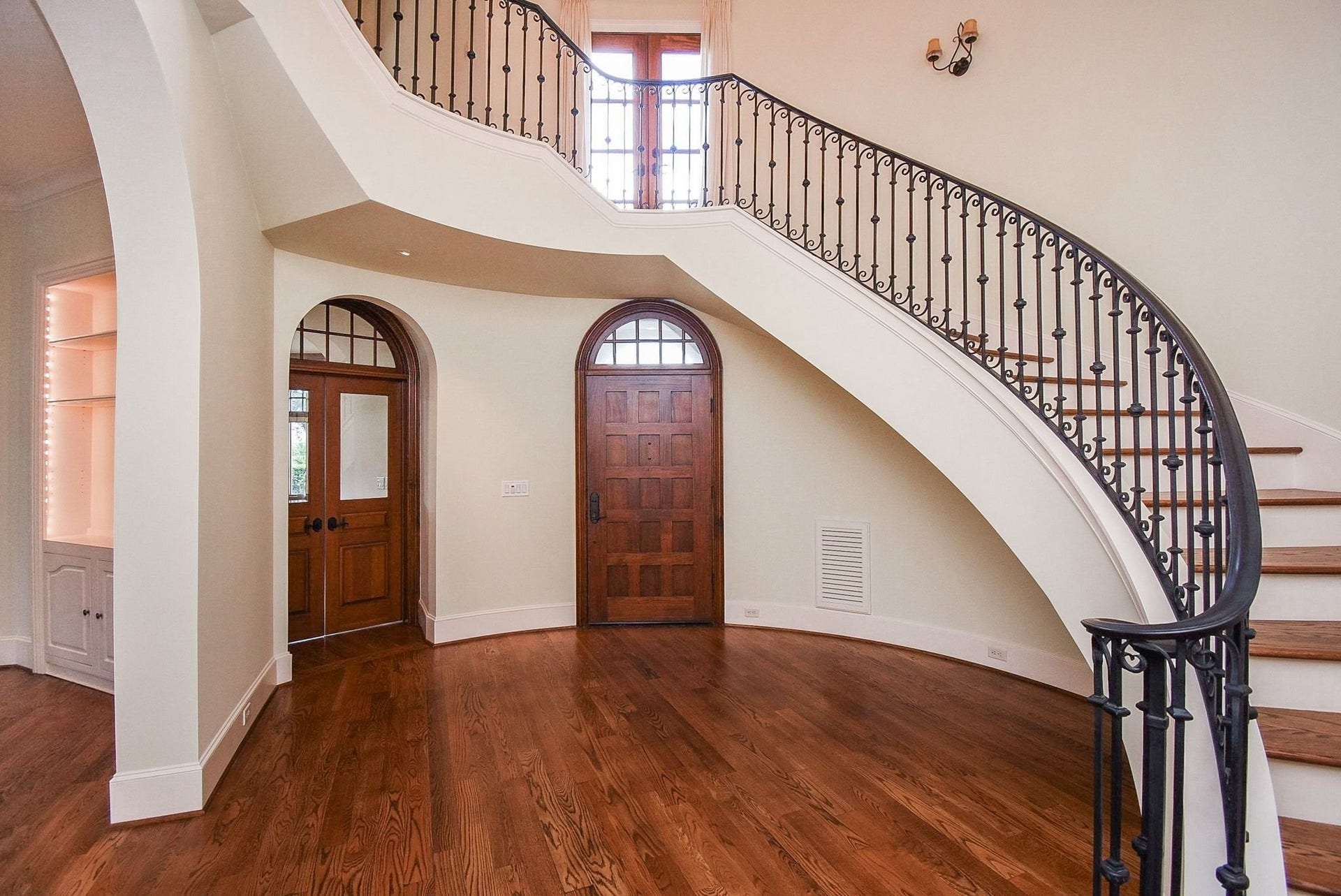 Alternate view of entry looking back at front door.  The double doors on the left are to the home office/study