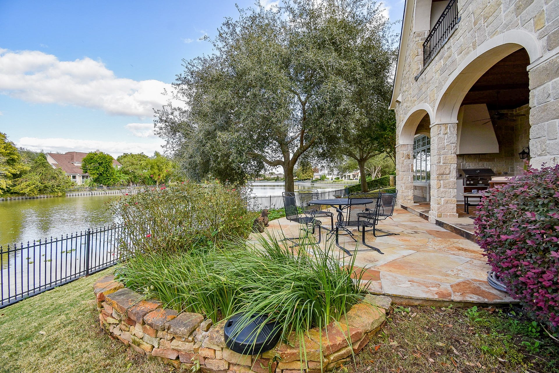 We saw the patio/outdoor kitchen earlier, but this is the extended patio and view of the extended waterfront