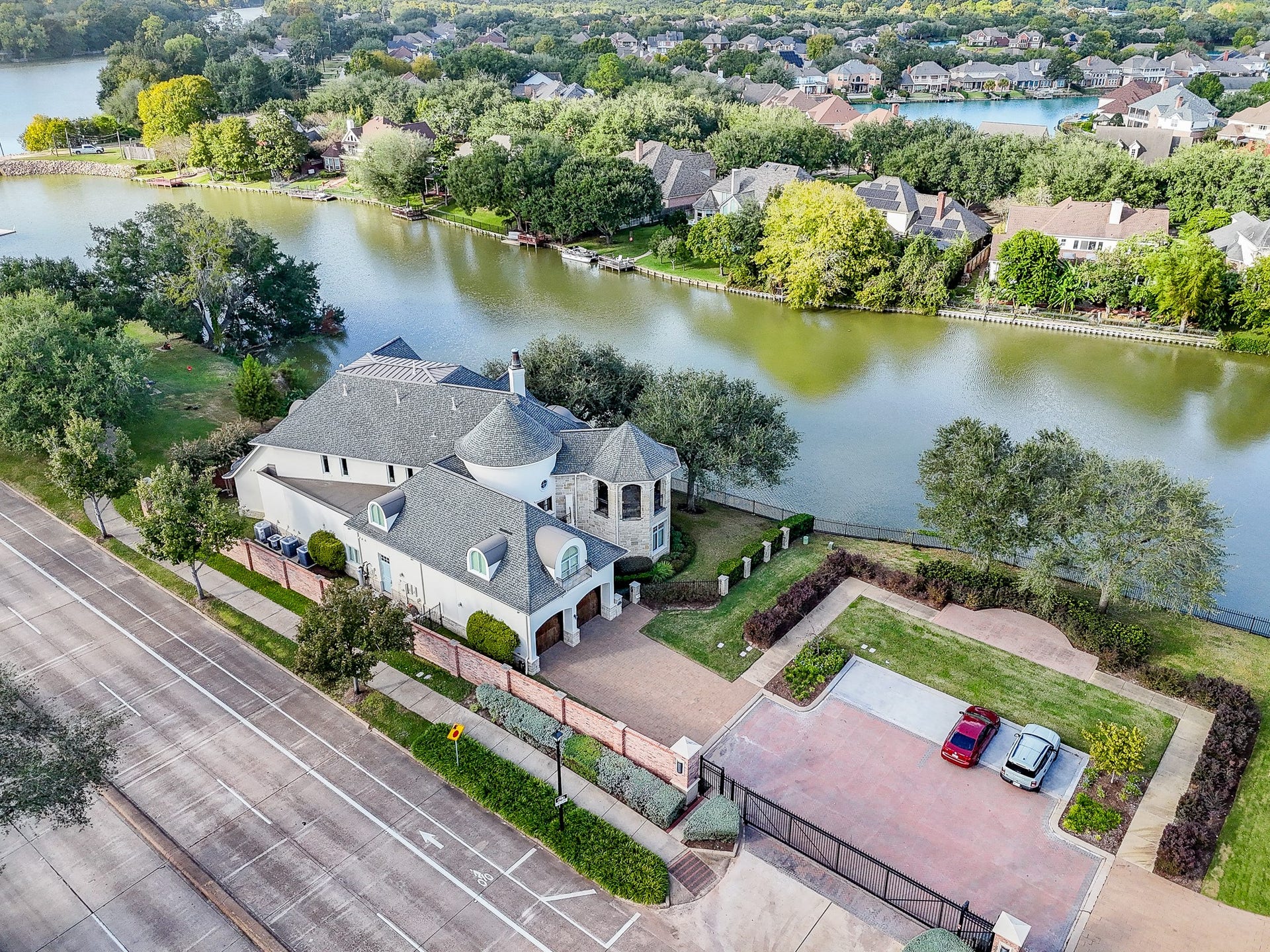 Fabulous Robert Dame French Country inspired home built with love in 2009 with panoramic water views.  Located in the heart of Lake Pointe with access to major thoroughfares, shopping and restaurants including nearby Sugar Land Town Square