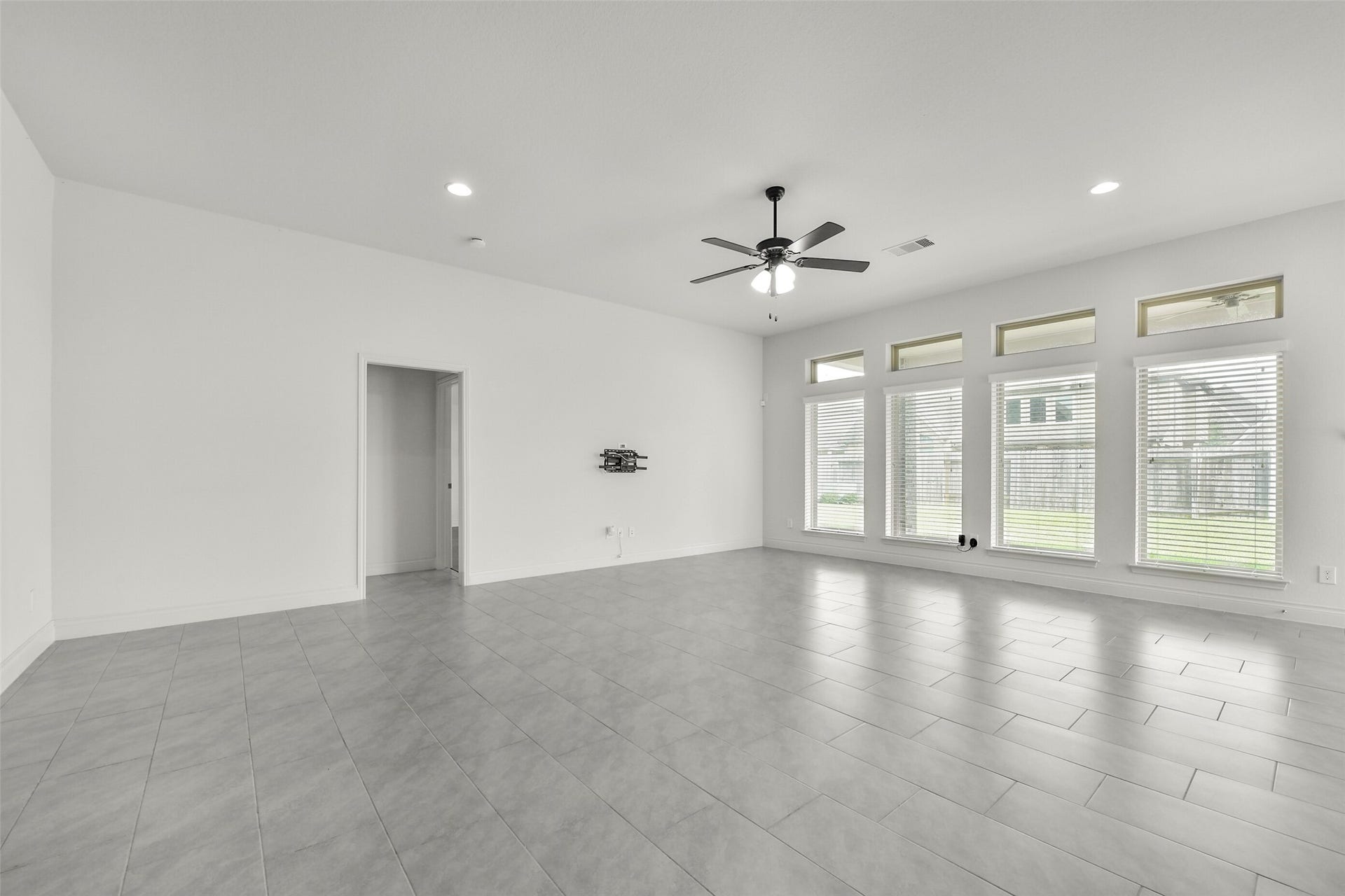 13615 Imperial Island Lane, Pearland, TX 77584 Tall windows in living room for a luxury feel