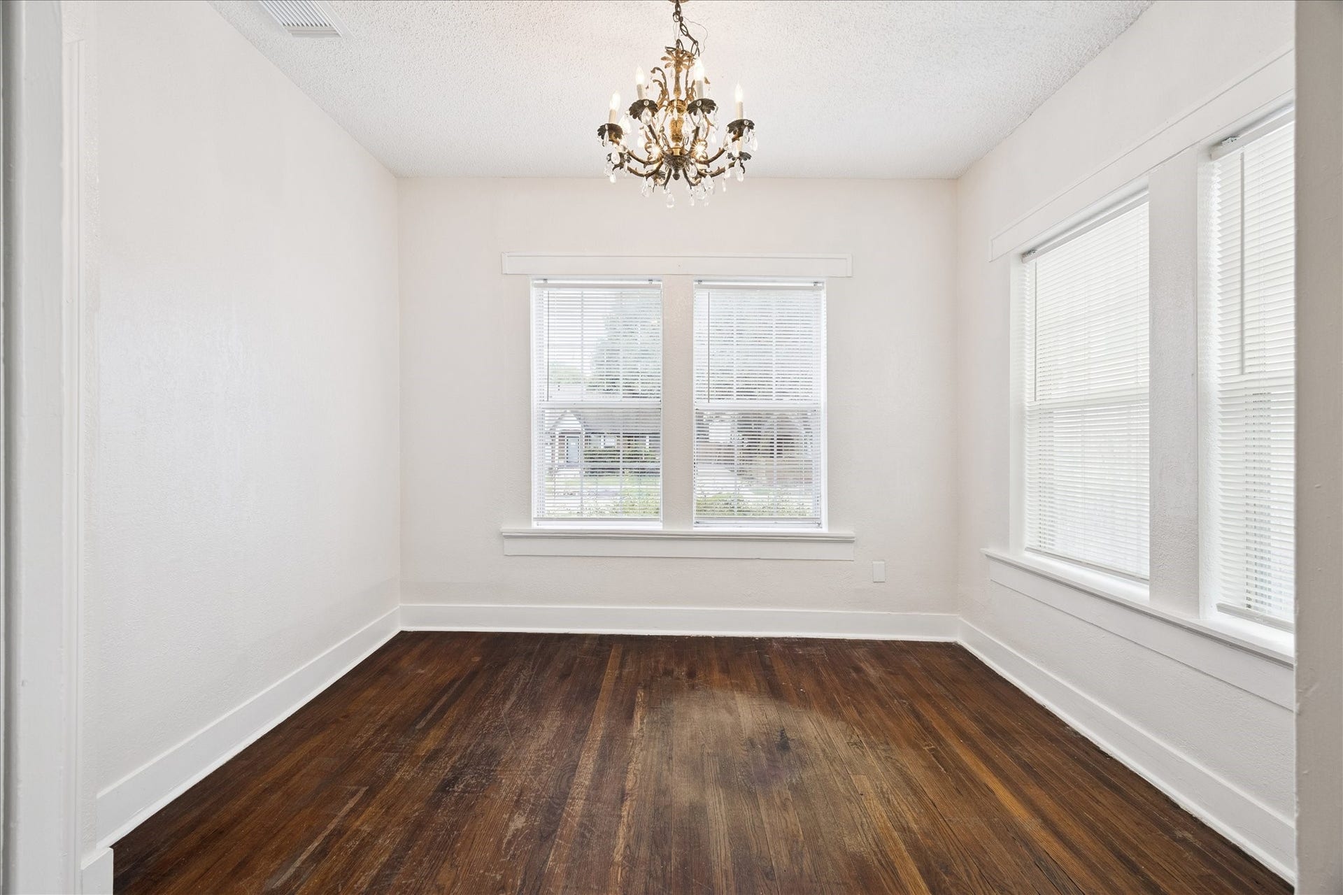 1921 Harold Street, Houston, TX 77098 At home office, guest bedroom or sunroom with chic chandelier.