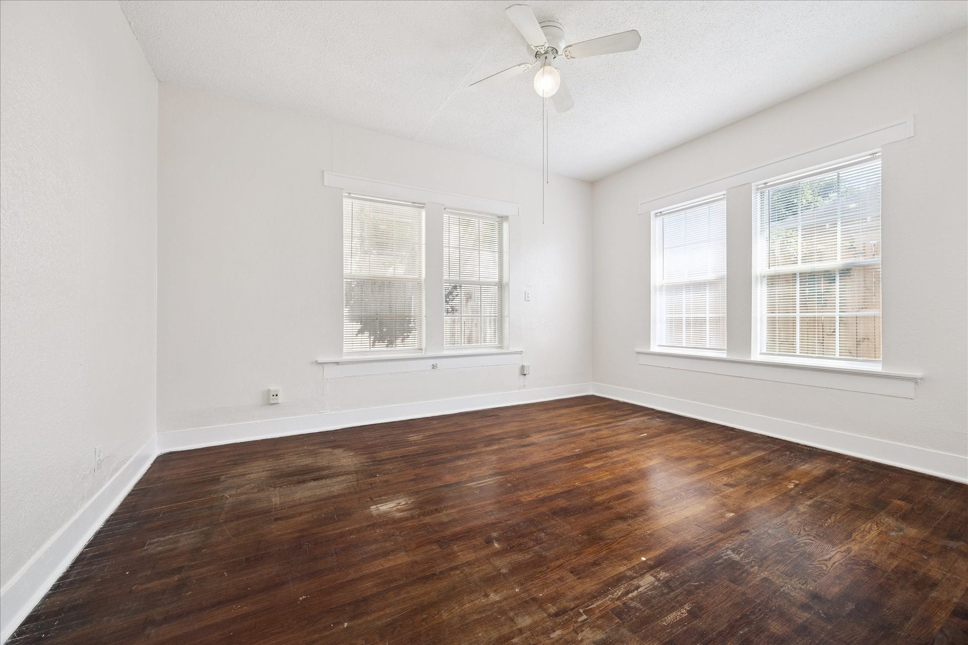 1921 Harold Street, Houston, TX 77098 Primary bedroom with hardwood floors and plenty of natural light.