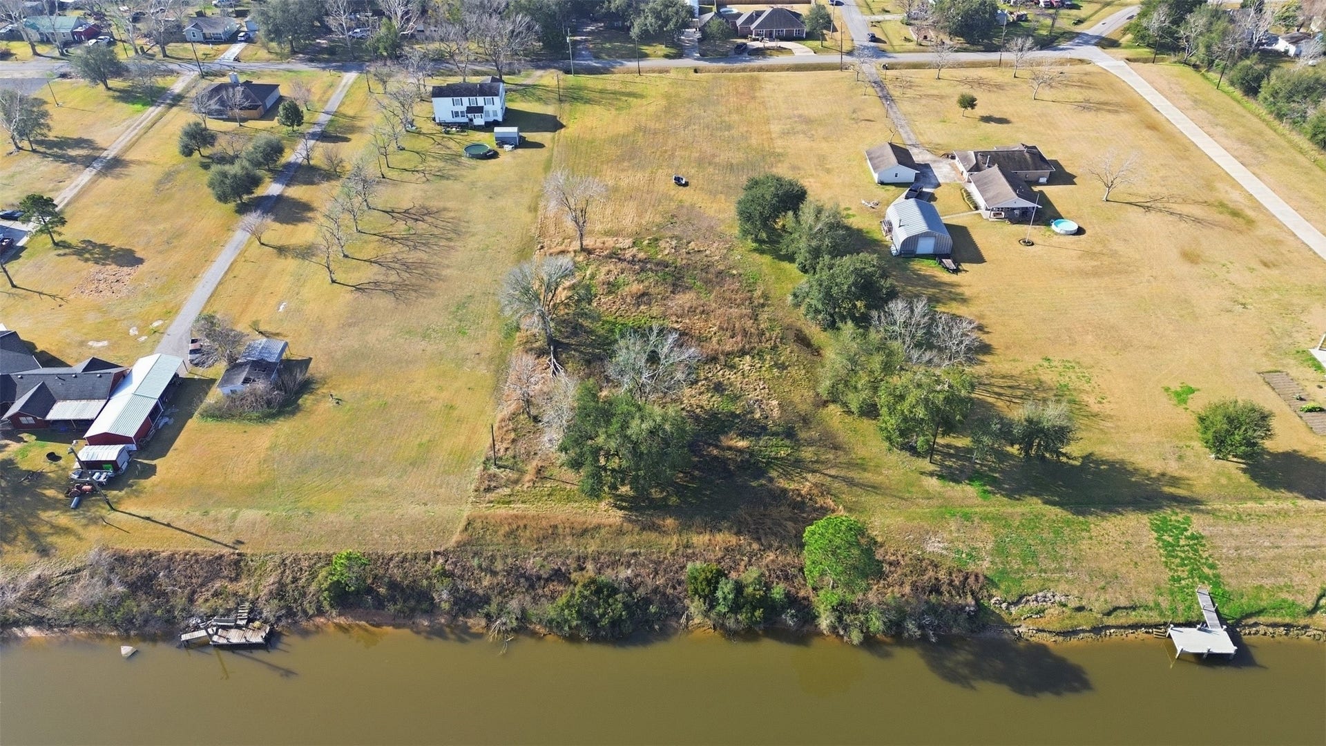 0 Robinson Road, Hitchcock, TX 77563 Property is easy to maintain with partially cleared area.