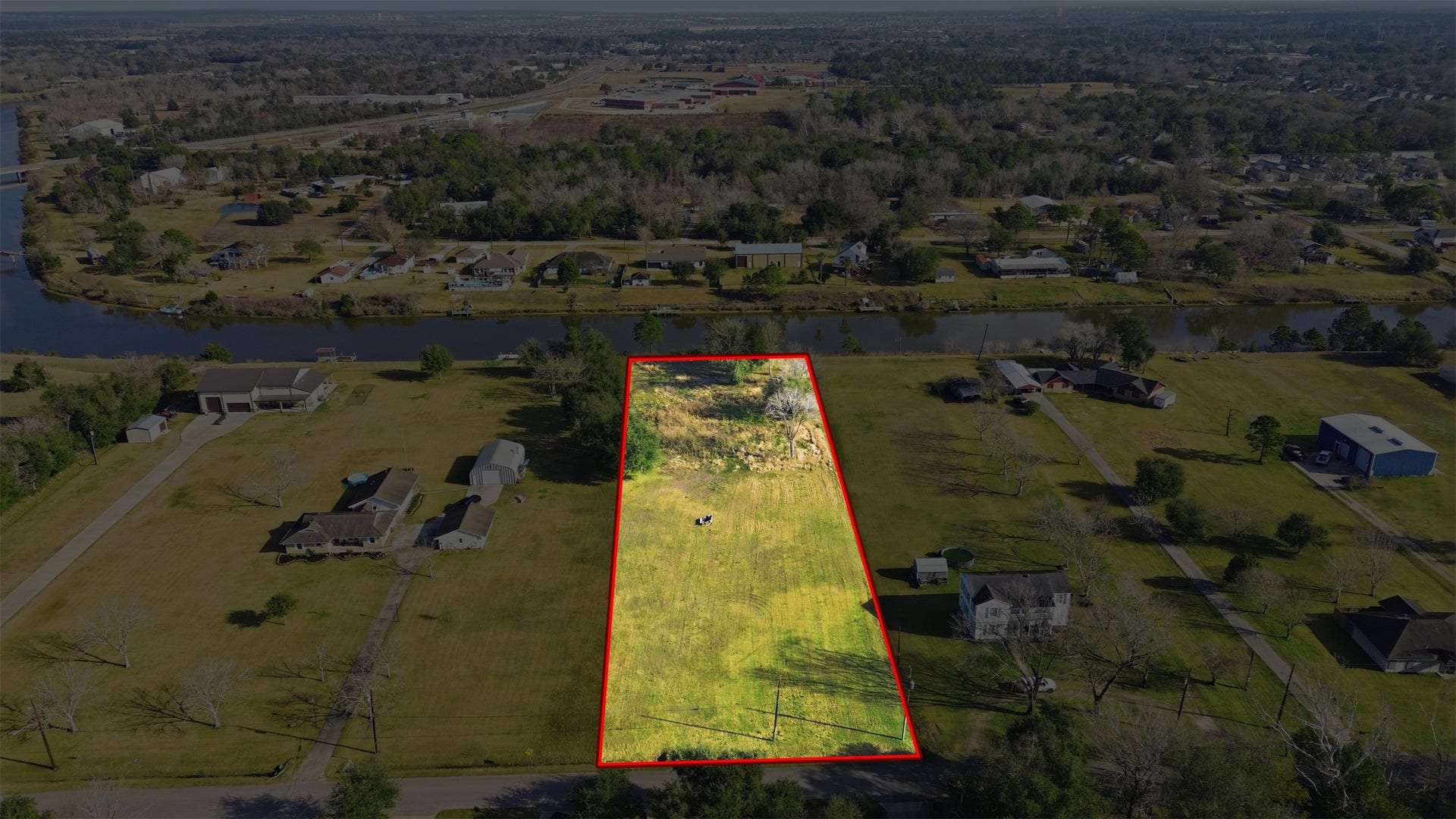 0 Robinson Road, Hitchcock, TX 77563 Waterfront acreage with public utilities.