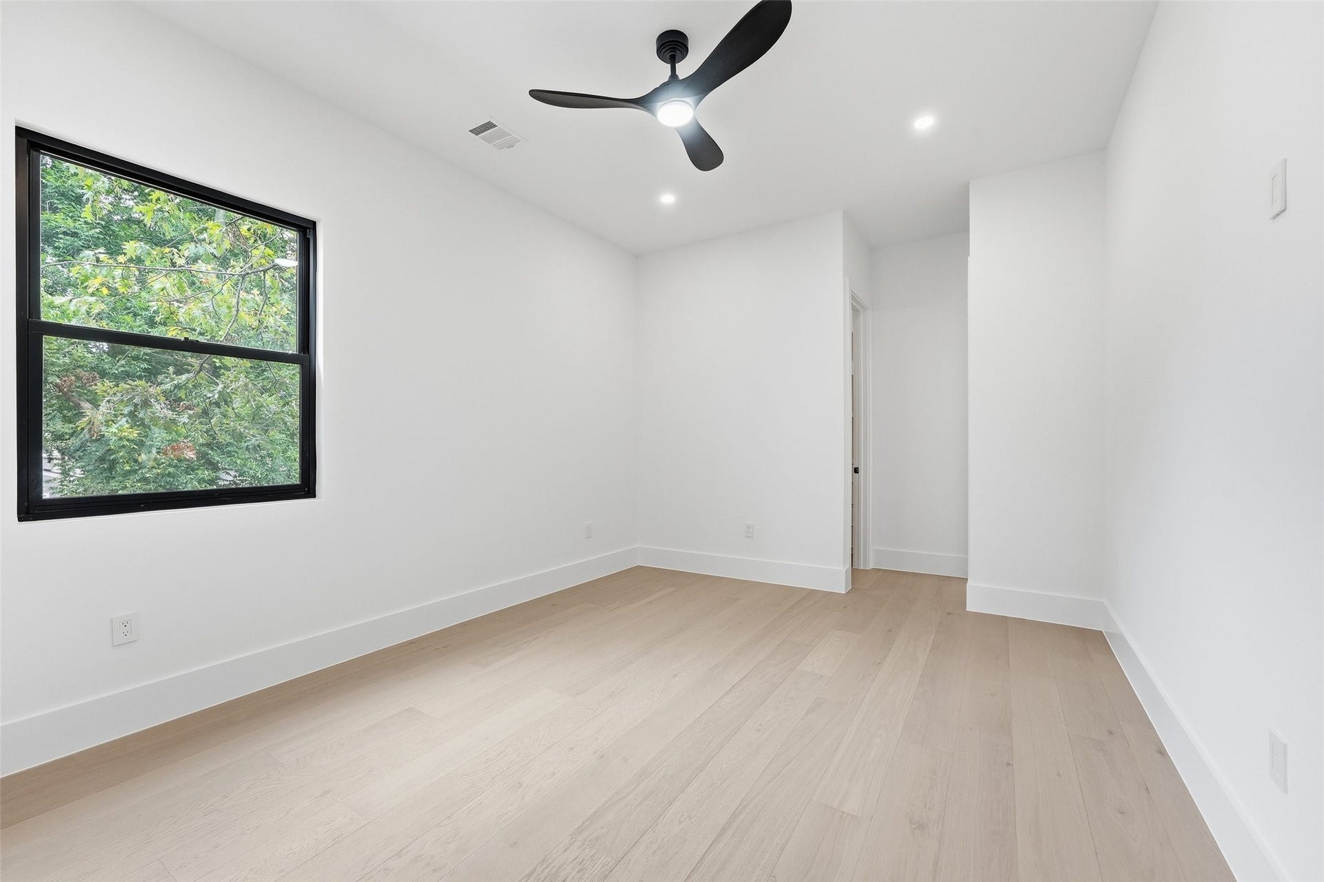 519 W 30th Street, Houston, TX 77018 Upstairs bedroom three is privately positioned away from the other bedrooms, creating an ideal guest retreat with added comfort and privacy