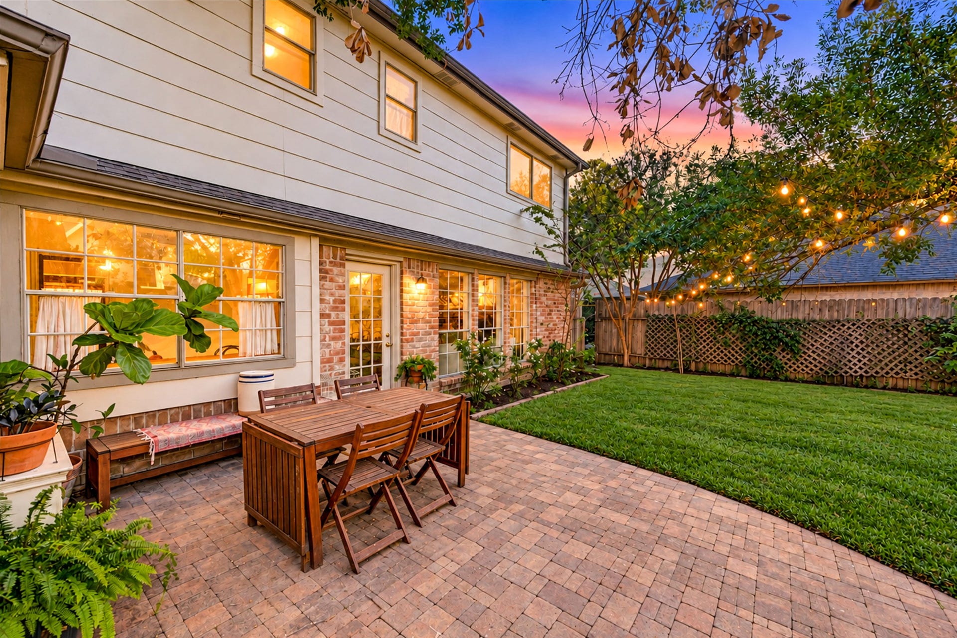 11423 Inwood Drive, Houston, TX 77077 Your own backyard oasis awaits! This expansive brick paver patio creates the perfect setting for alfresco dining, weekend barbecues and memorable evenings under the stars. Surrounded by lush landscaping and mature trees, the inviting outdoor living space offers plenty of room to gather, relax and entertain. Imagine unwinding with a glass of wine as the sun sets and the patio lights create a warm, welcoming glow. Outdoor living at its finest!