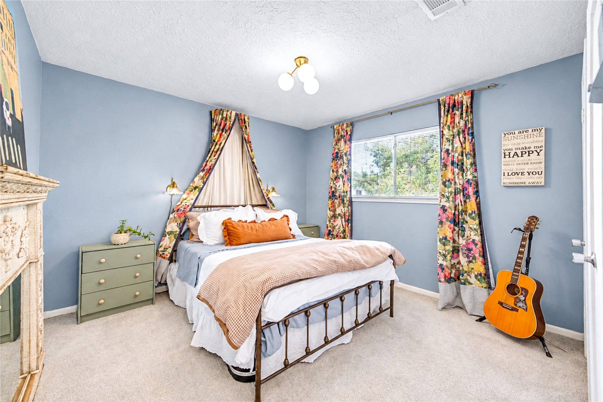 11423 Inwood Drive, Houston, TX 77077 A charming retreat with personality to spare! This spacious second bedroom features soothing blue walls, abundant natural light and thoughtfully curated designer touches that create a warm, inviting atmosphere. With room to relax, recharge or express your personal style, this versatile second-floor bedroom offers a cozy escape that feels both comfortable and effortlessly stylish!