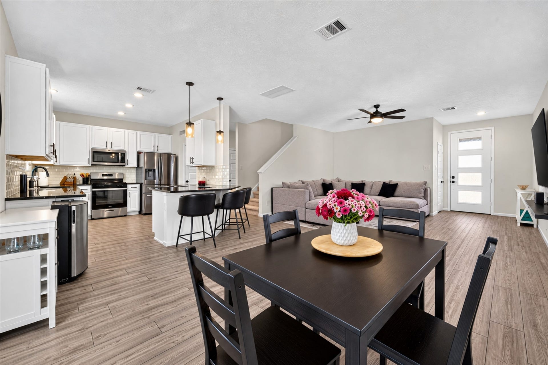 9453 Castillo Court, Magnolia, TX 77354 Enjoy the convenience of a dining area that flows seamlessly into the kitchen and living room. Whether hosting dinner or enjoying a quiet meal, this open layout makes every occasion feel connected.