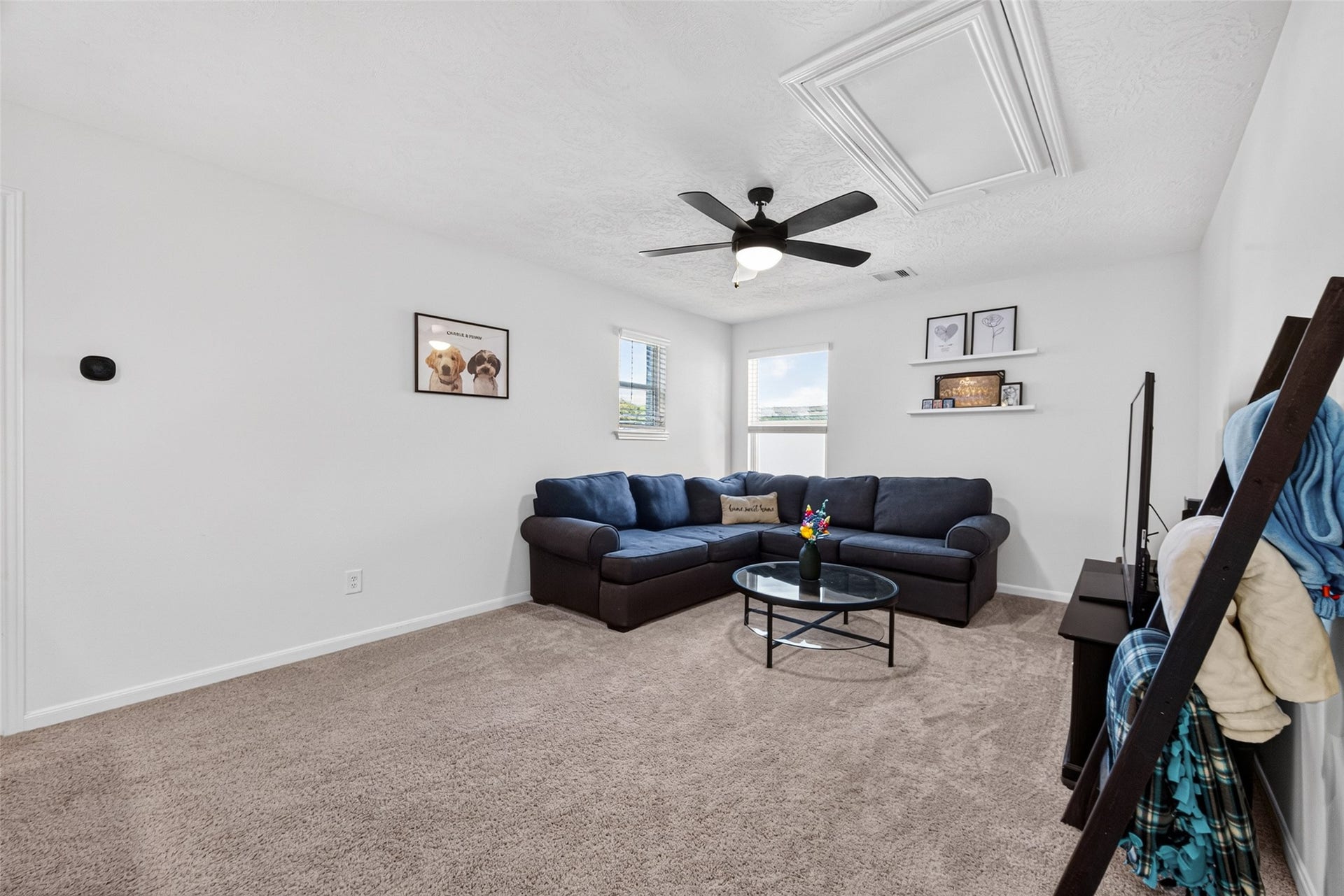 9453 Castillo Court, Magnolia, TX 77354 Enjoy the flexibility of a second living area upstairs, separate from the main living room. Whether watching movies, entertaining guests, or enjoying a hobby, this inviting space offers room to make it your own.
