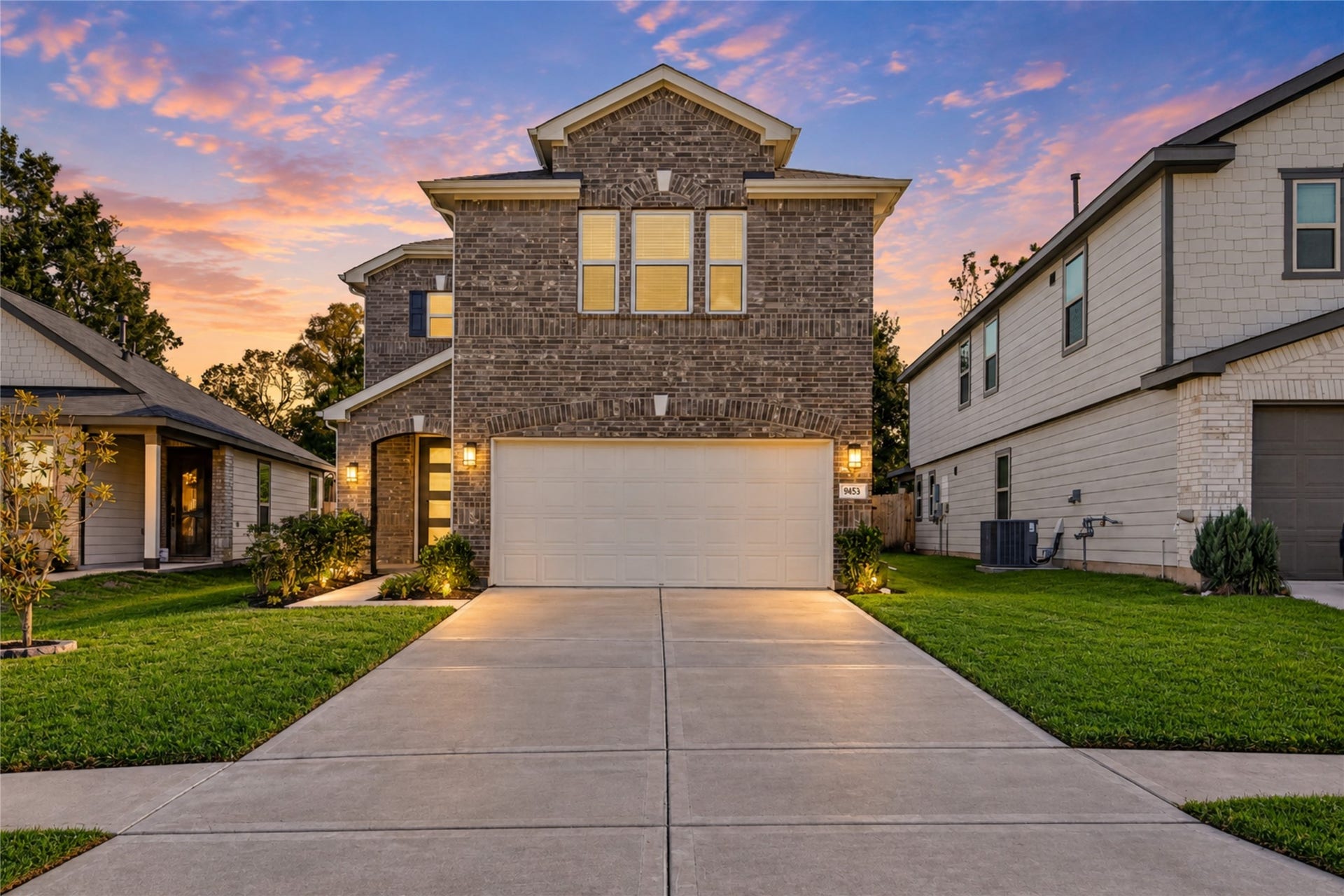 9453 Castillo Court, Magnolia, TX 77354 Fall in love with the beautiful curb appeal of this inviting two-story home, where attractive brickwork, manicured landscaping, and warm exterior lighting create a stunning first impression.