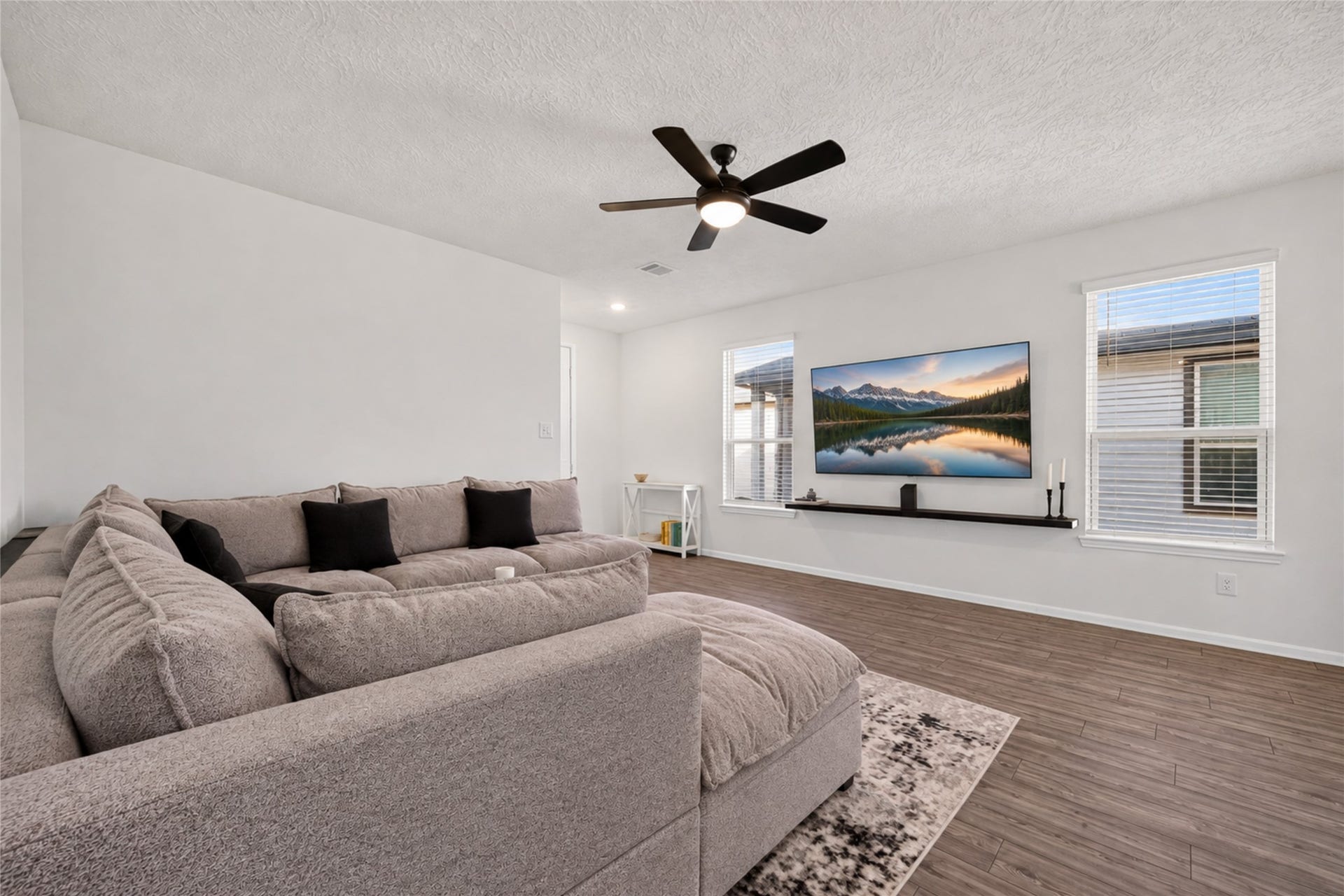 9453 Castillo Court, Magnolia, TX 77354 Enjoy movie nights, your favorite shows, or simply unwinding in this spacious living area. The neutral finishes and open design make it easy to personalize the space to reflect your style.