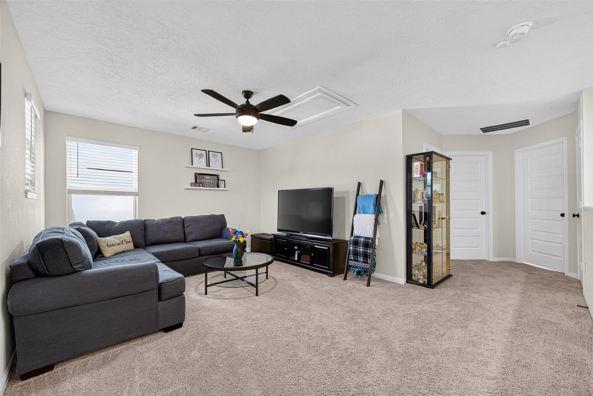 9453 Castillo Court, Magnolia, TX 77354 The spacious upstairs game room offers endless possibilities for recreation and relaxation. Imagine creating a media lounge, gaming retreat, or entertainment space tailored to your favorite activities.