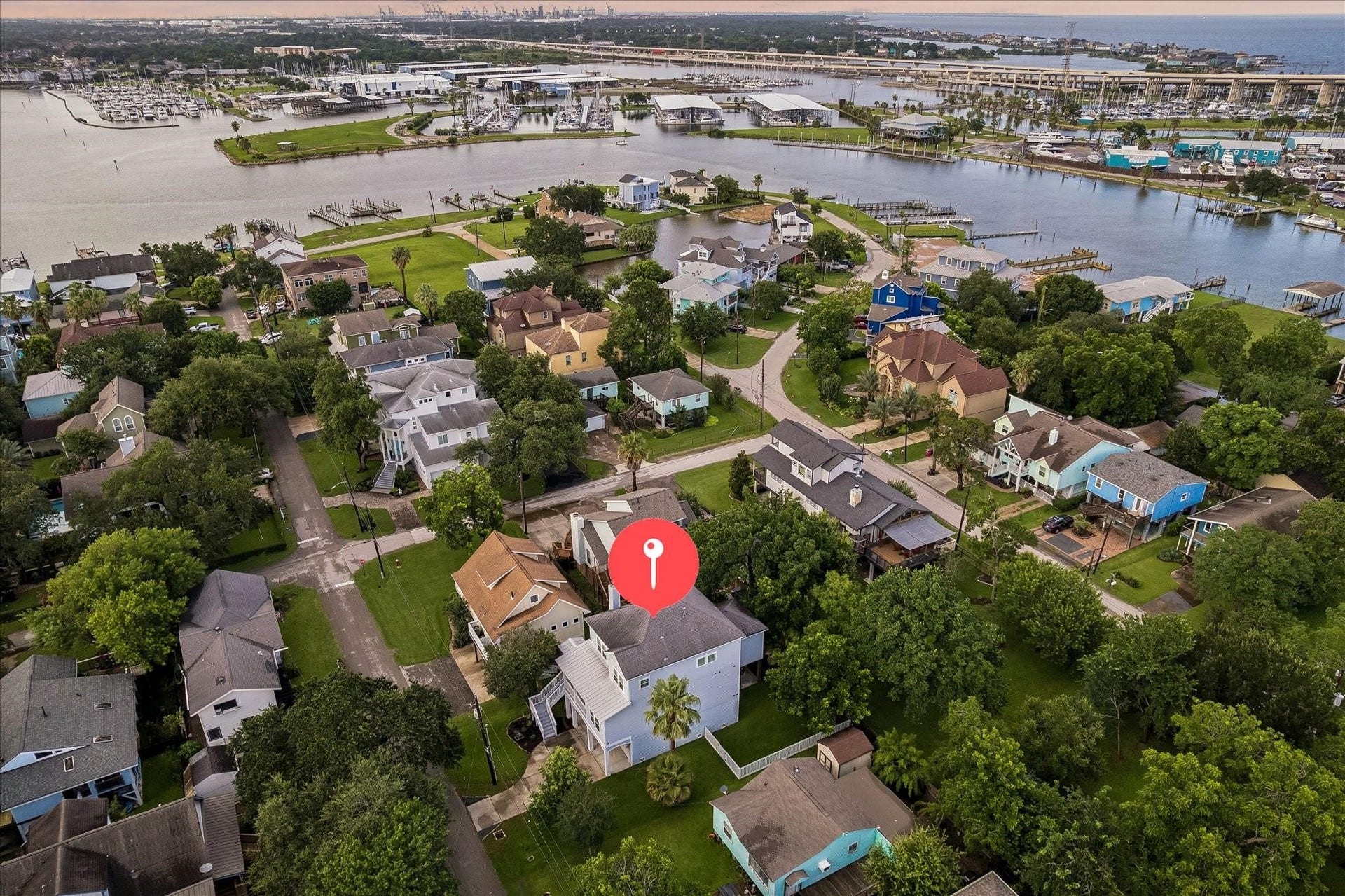 209 Queen Road, Clear Lake Shores, TX 77565 Aerial view showcasing the homes proximity to Clear Lake and the Kemah Channel