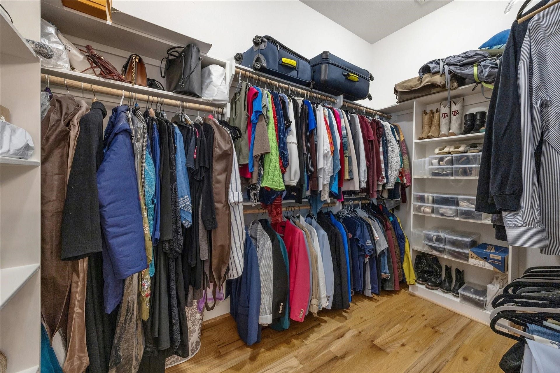 209 Queen Road, Clear Lake Shores, TX 77565 Walk-in closet with custom storage in a neat and organized layout