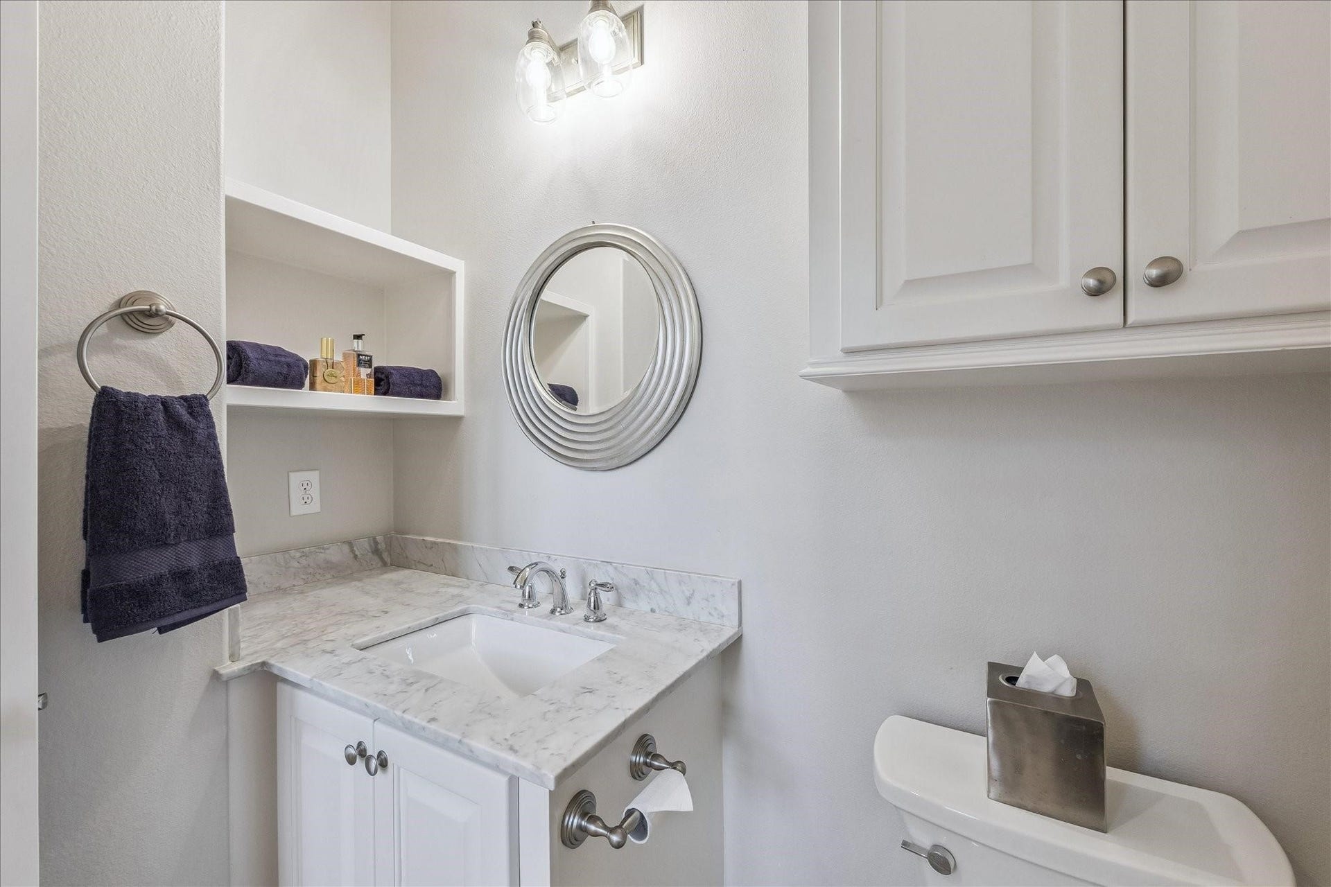 209 Queen Road, Clear Lake Shores, TX 77565 Half bath off the Great Room with under-mount sink, added storage and sleek design