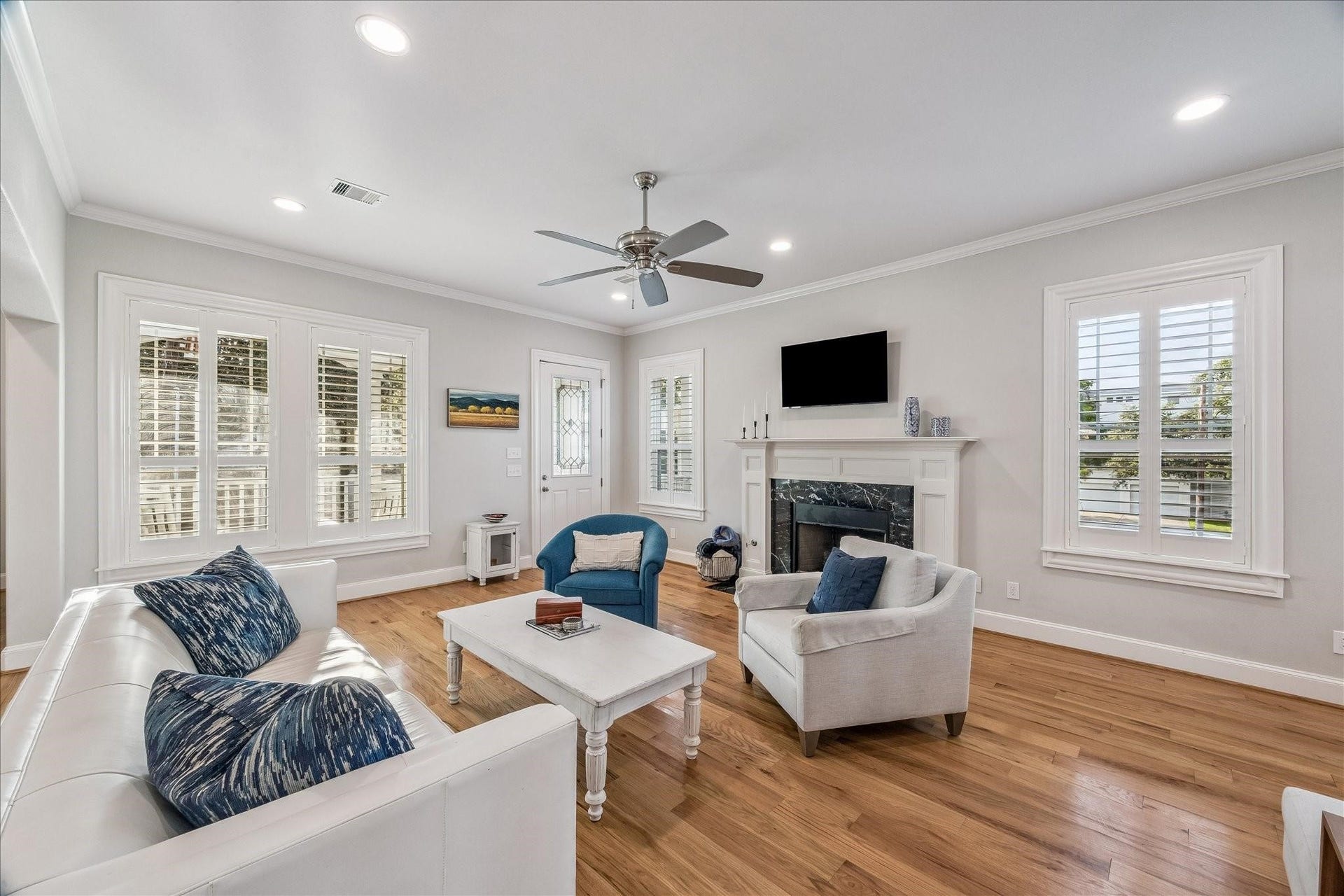209 Queen Road, Clear Lake Shores, TX 77565 The space illuminates with tons of natural lighting from the large windows with Plantation shutters throughout the home