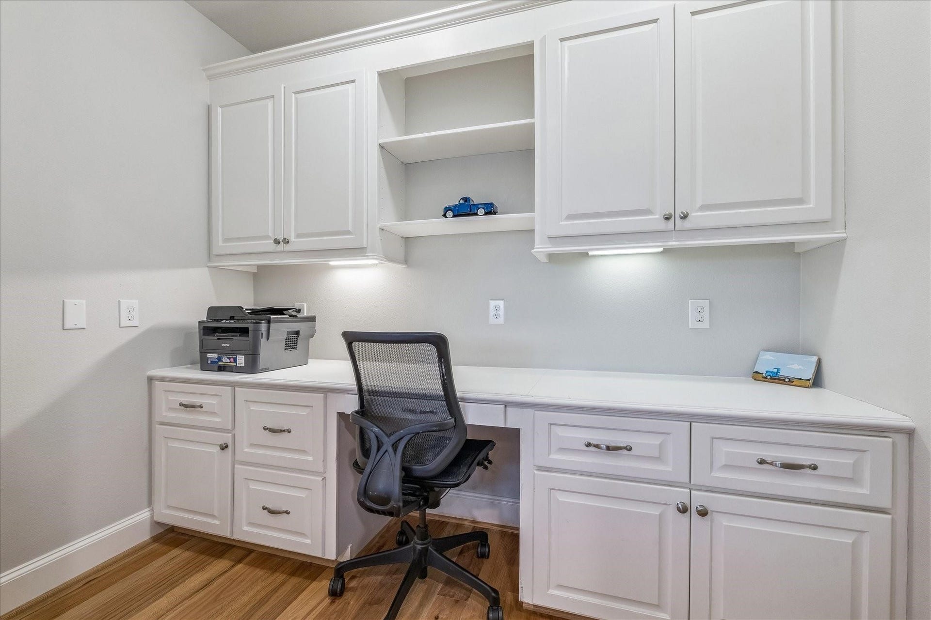 209 Queen Road, Clear Lake Shores, TX 77565 Home office with custom built-in desk, perfect for a functional and tidy homework or work-from-home setup