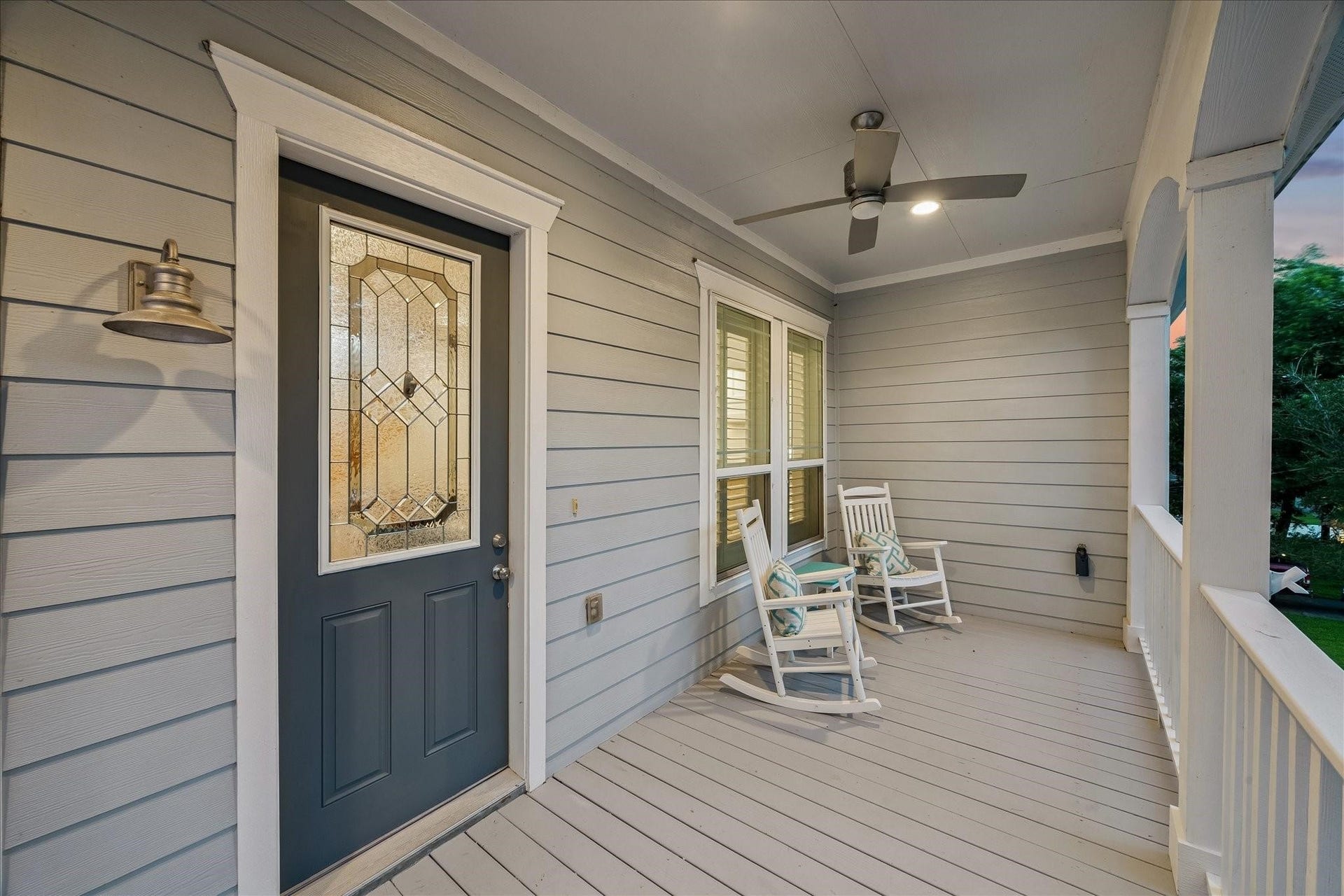 209 Queen Road, Clear Lake Shores, TX 77565 Relax on the covered front porch with a decorative glass front door and ceiling fan for comfort. Perfect for morning coffee or an evening cocktail