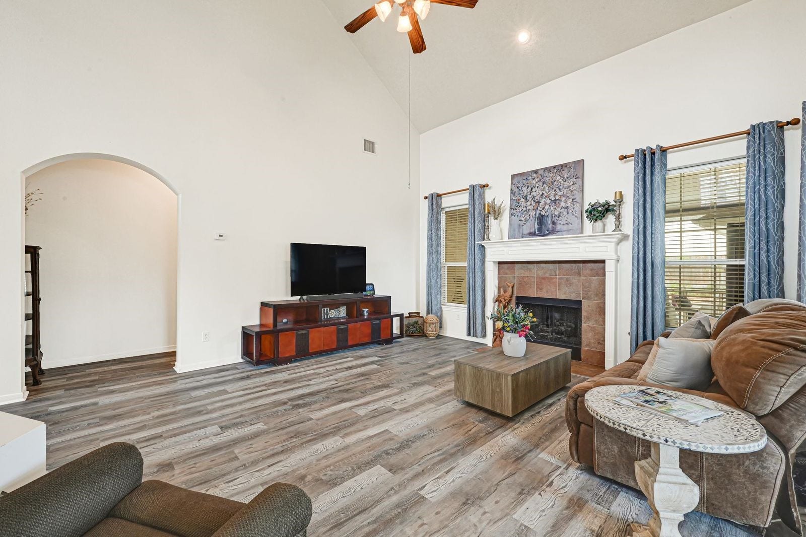 3422 Bay Breeze Drive, Seabrook, TX 77586 Large windows bringing in natural light. Fireplace with gas logs
