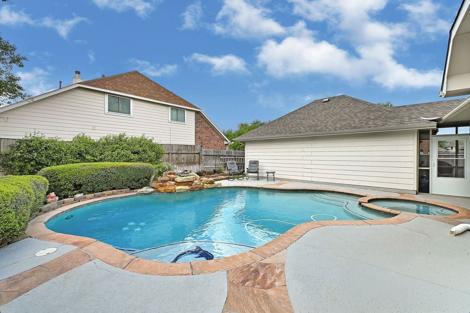 3422 Bay Breeze Drive, Seabrook, TX 77586 Gorgeous swimming pool with waterfall