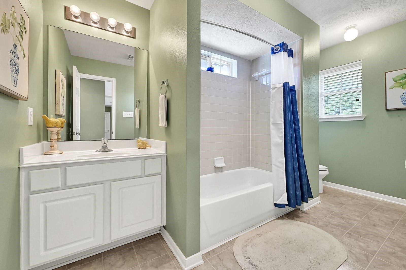 3422 Bay Breeze Drive, Seabrook, TX 77586 Roomy Bathroom with a shower tub combo next to bedroom 4