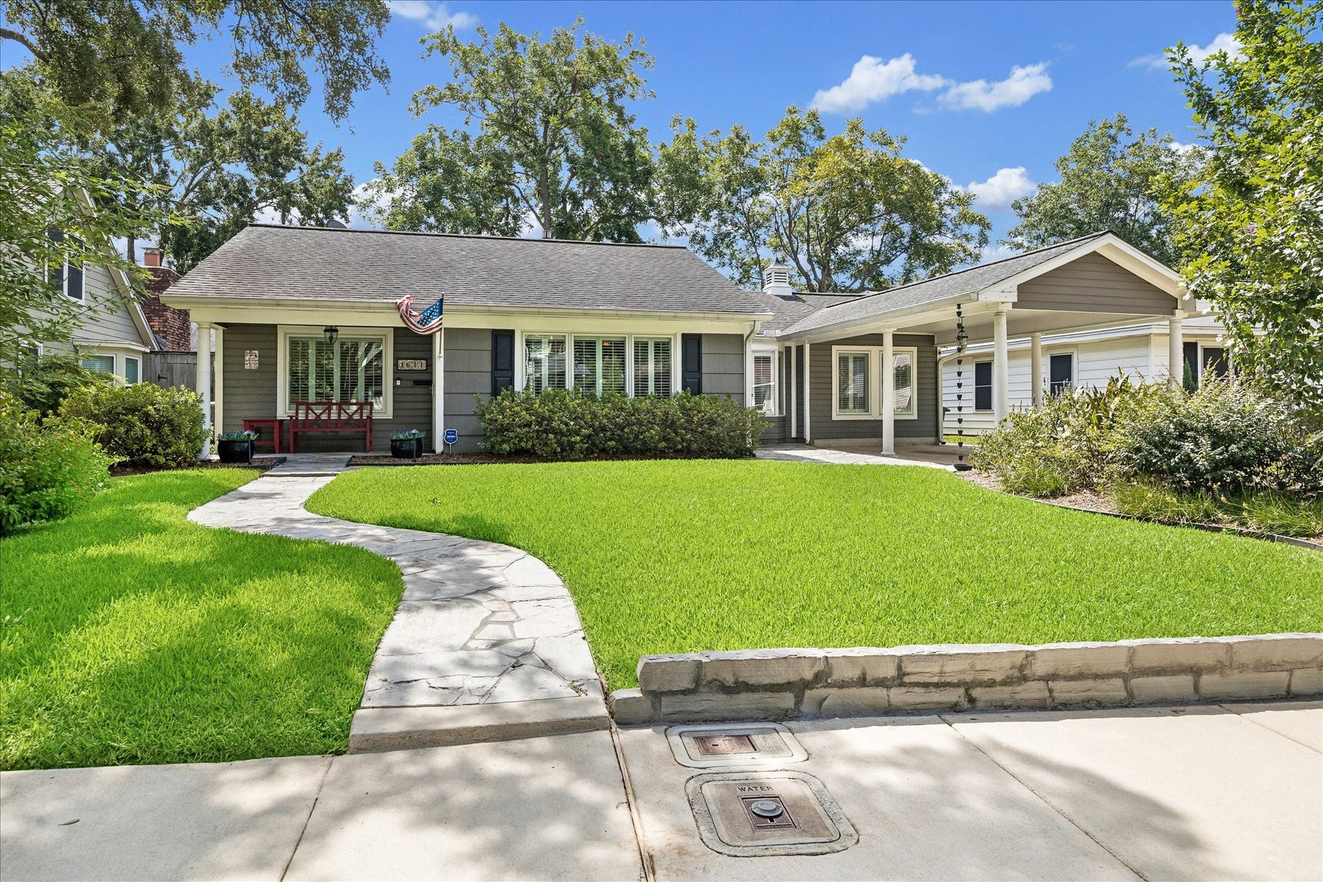1611 Gardenia Drive, Houston, TX 77018 Set beneath a canopy of mature trees, this Oak Forest home welcomes with a wide front lawn, established landscaping and a winding walkway leading to the covered entry. Classic architecture and inviting curb appeal feel right at home in the neighborhood.