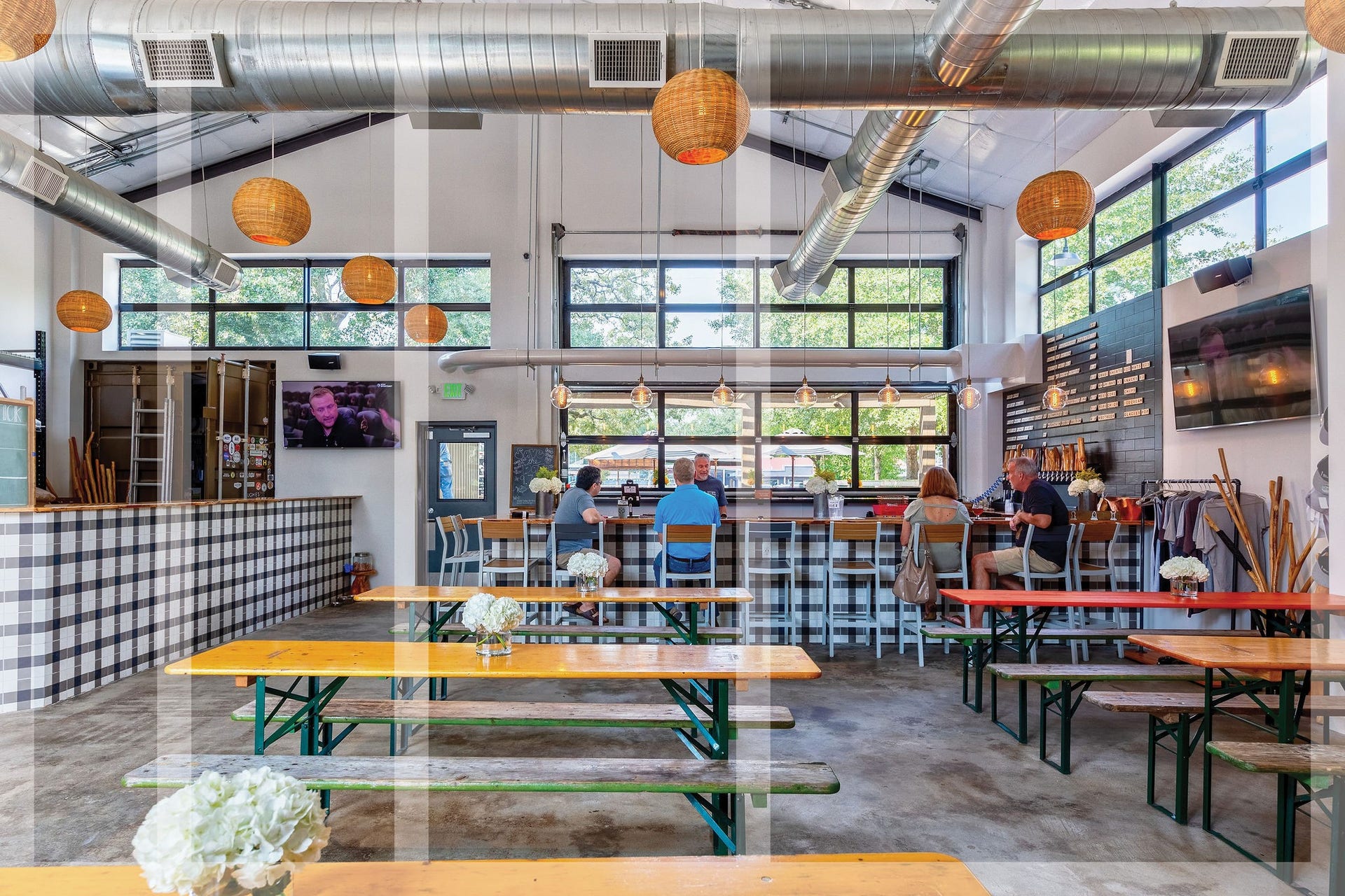 1611 Gardenia Drive, Houston, TX 77018 Walls of windows infuse illumination throughout the industrial interior, creating a dynamic warehouse interior that hosts the 10-barrel brewery.