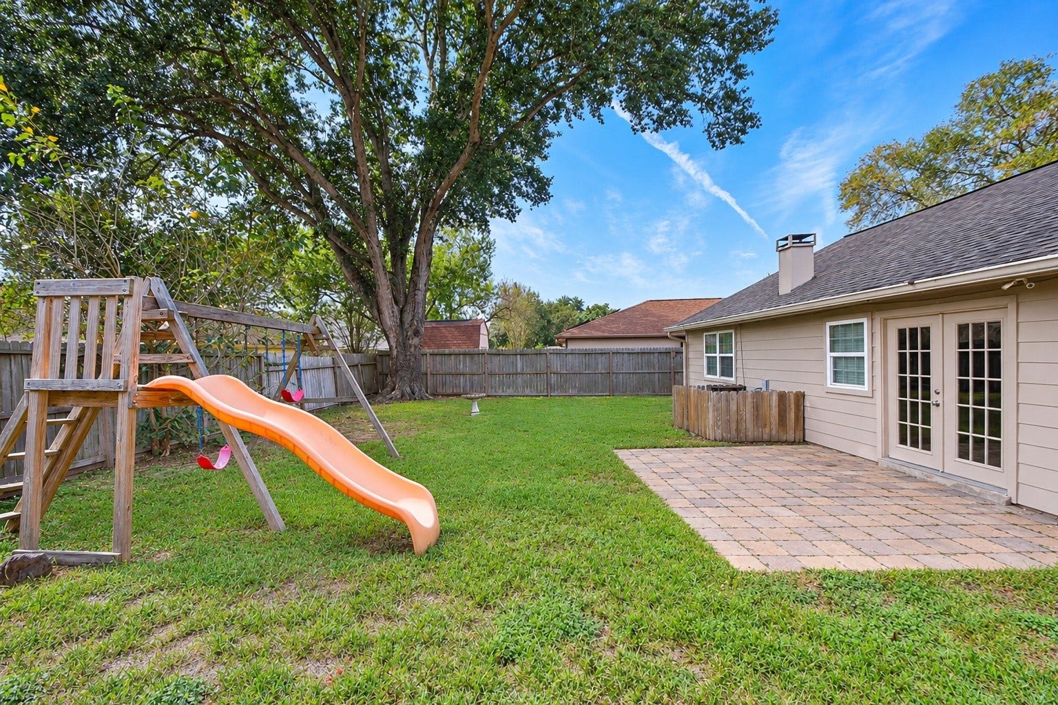 1011 Comstock Springs Drive, Katy, TX 77450 Patio and swingset