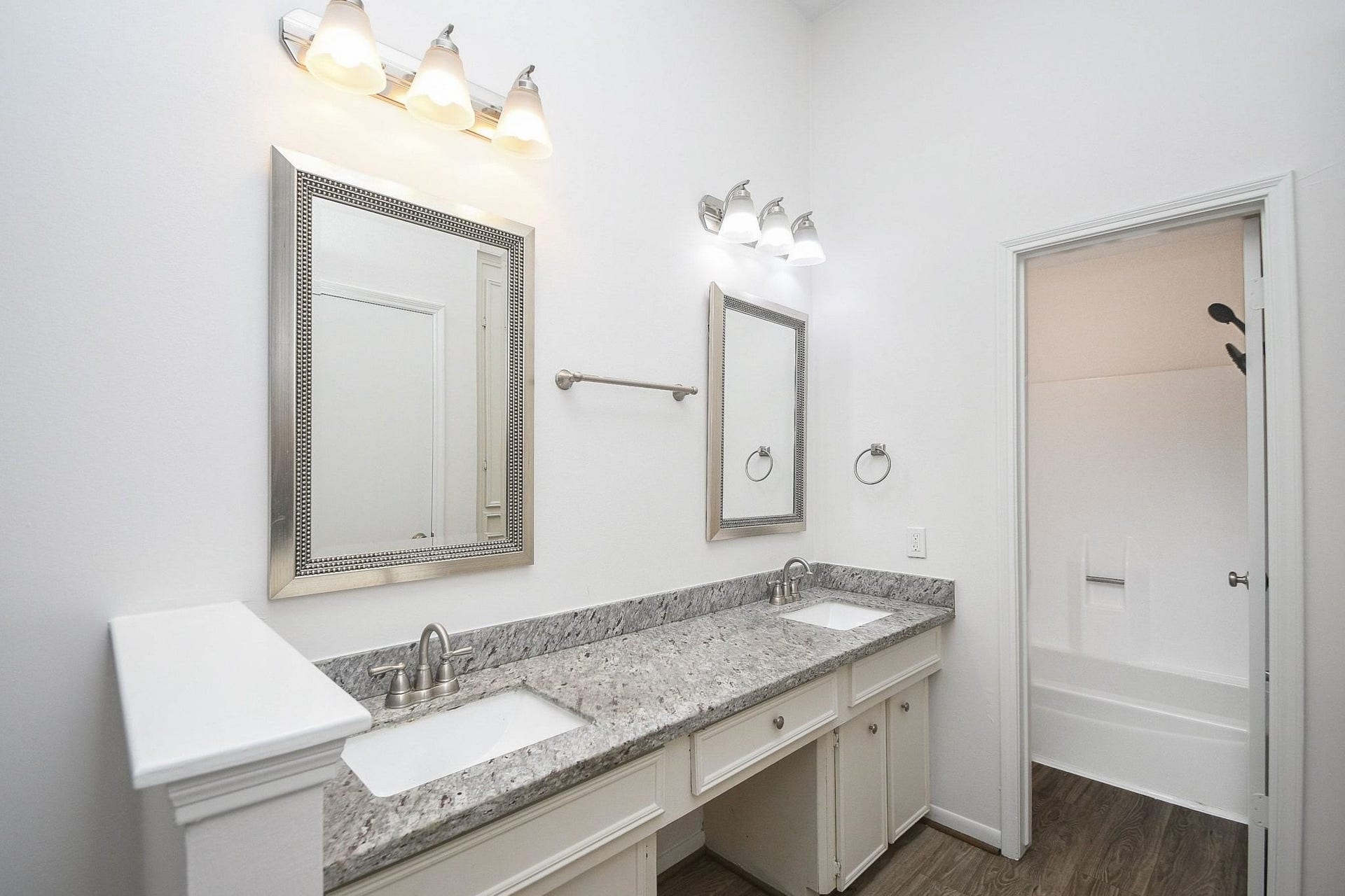 1011 Comstock Springs Drive, Katy, TX 77450 Double sinks and vanity seating area.