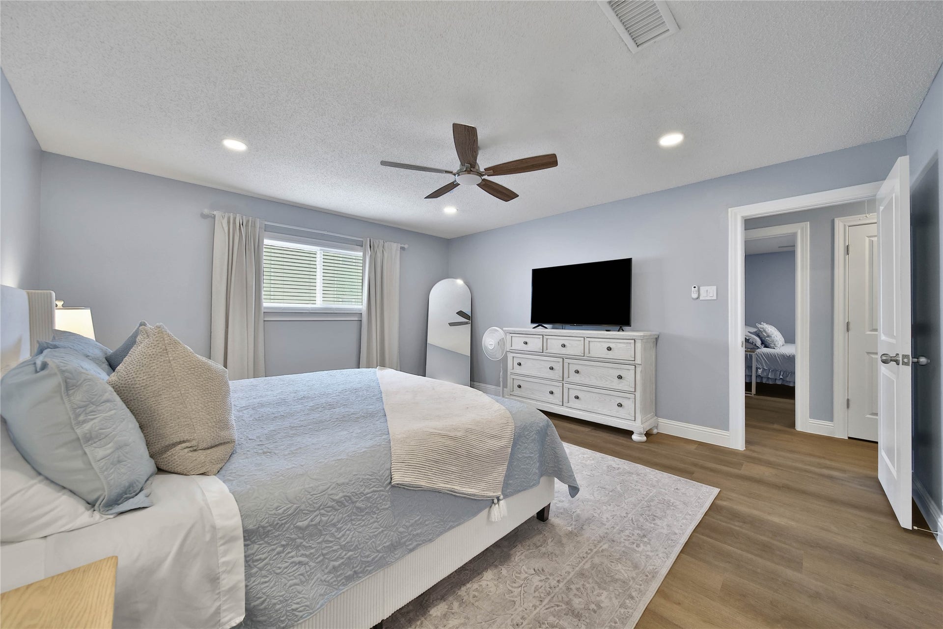 3700 83rd Street, #4, Galveston, TX 77554 Master ensuite with king size bed.