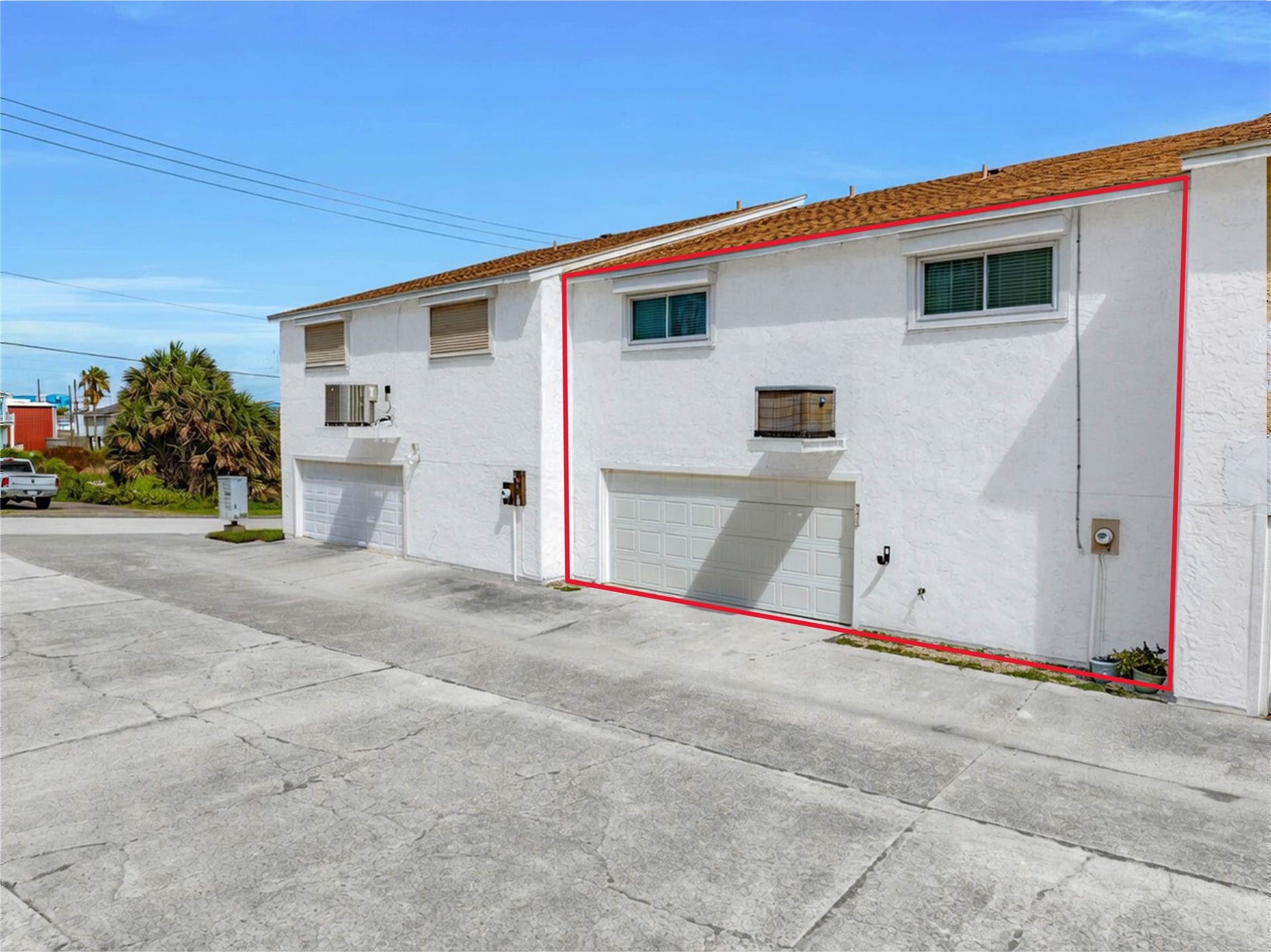 3700 83rd Street, #4, Galveston, TX 77554 Automatic entry with a new garage door and opener.