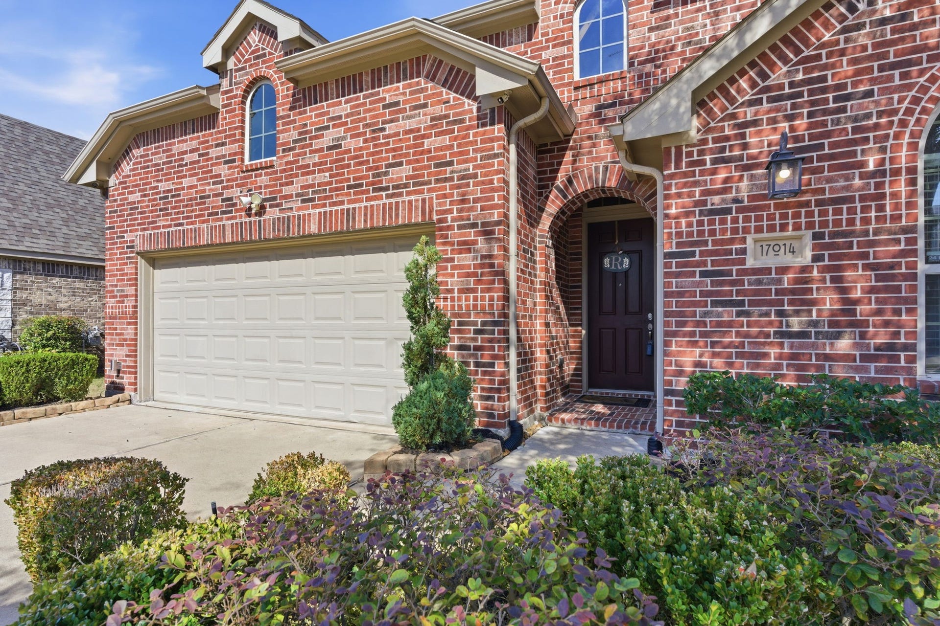 Beautiful landscaping welcomes you home!